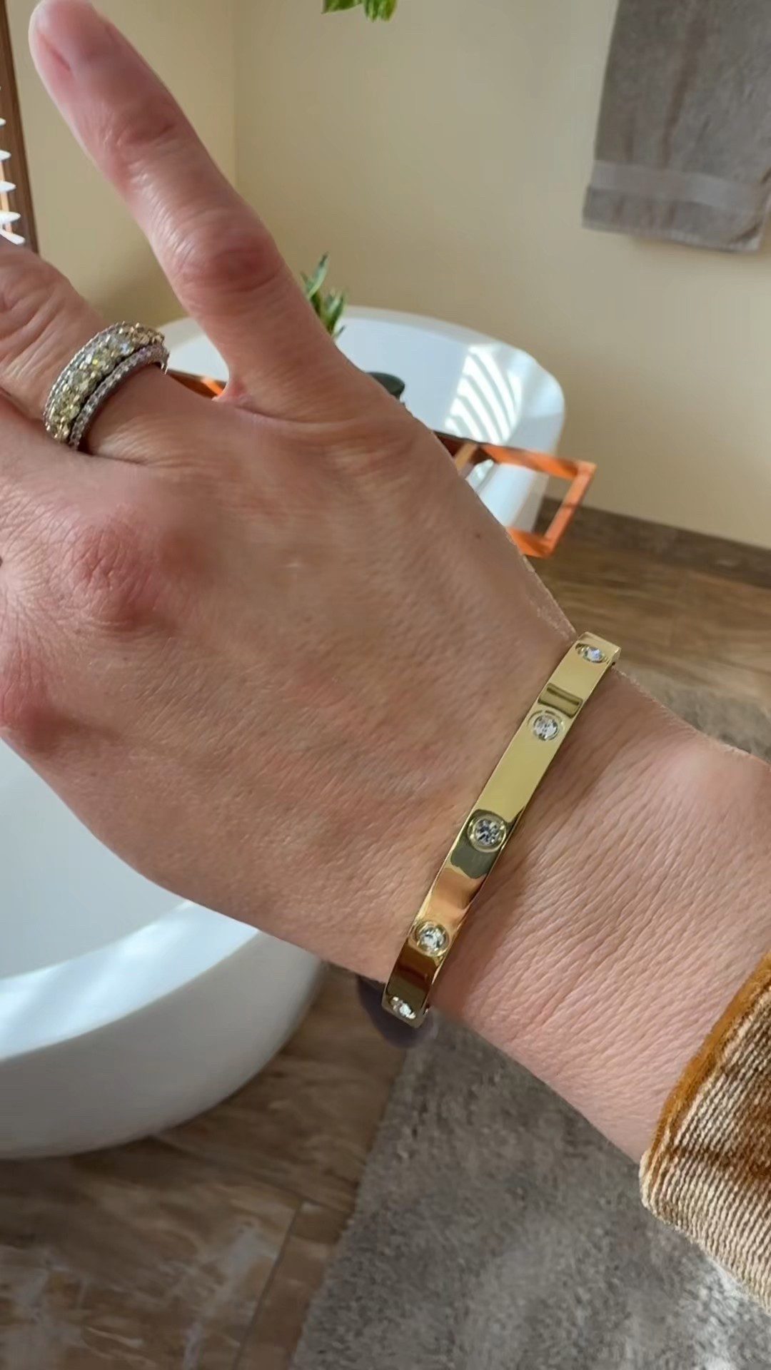 Minimal but makes a statement ✨ This PAVOI bangle shines with cubic zirconia crystals, is waterproof + tarnish resistant, and layers beautifully with your other bangles—or steals the spotlight on its own. #bangles #jewelry  

#LTKWorkwear #LTKFindsUnder50 #LTKGiftGuide
