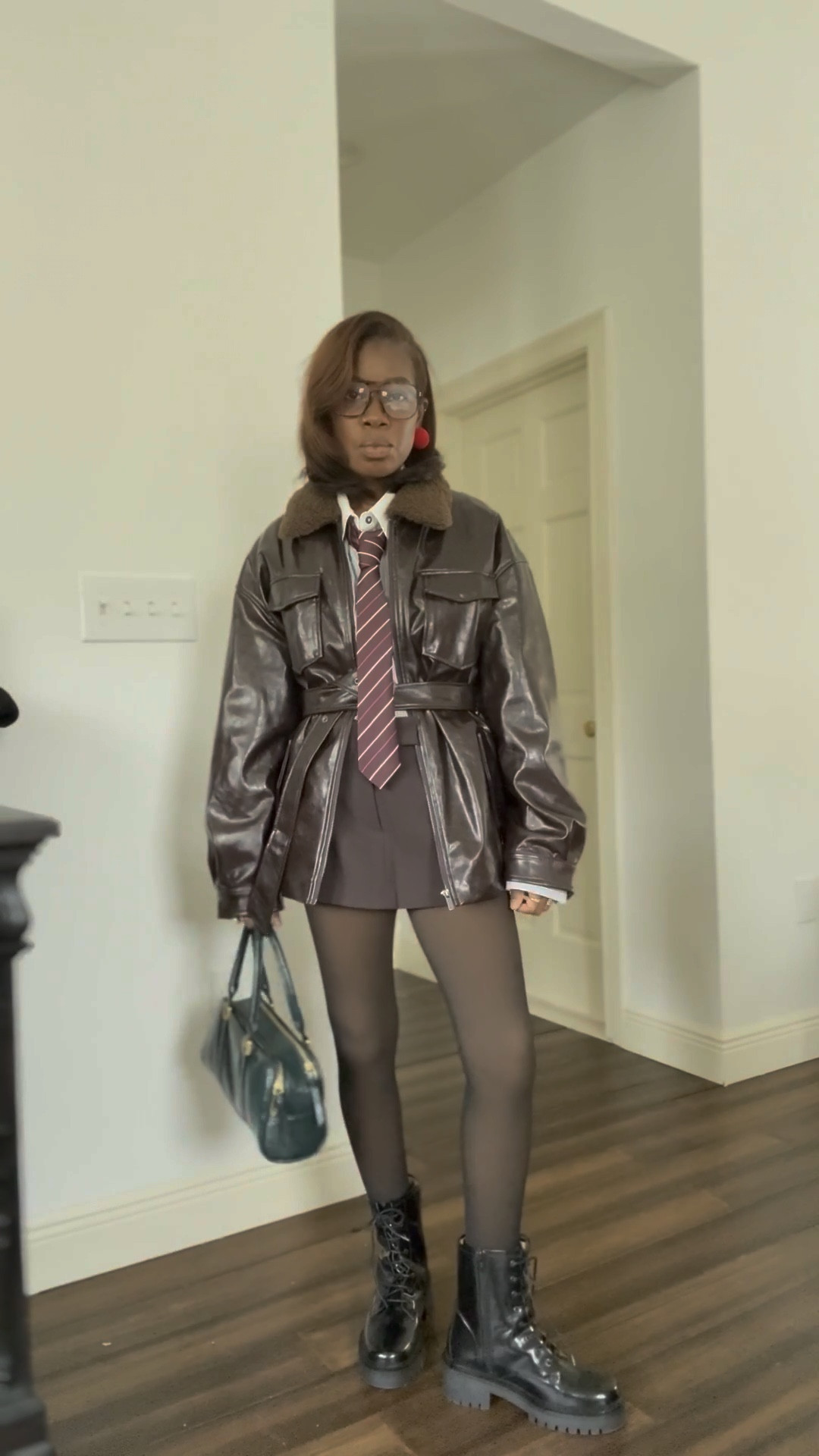 An outfit for Tokyo and most things are on sale sale! Button down with tie leather jacket black boots 

#LTKFindsUnder100 #LTKootd #LTKgrwm