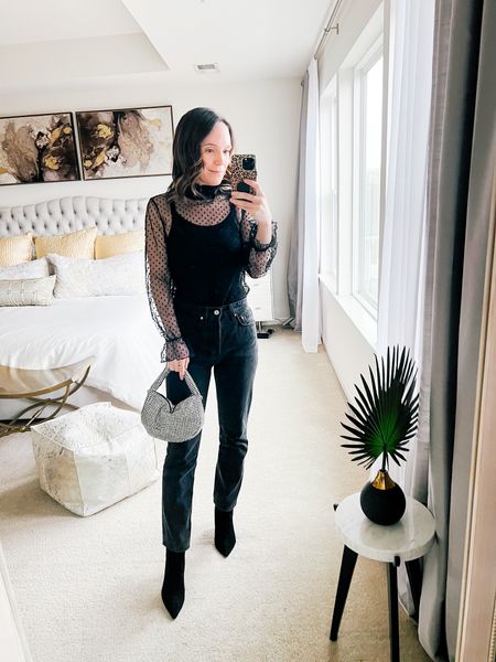 Black jeans, black sheer top, black boots 

#LTKover40 #LTKstyletip