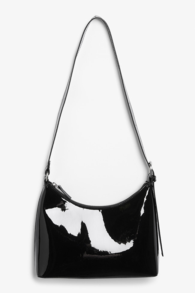 Black small patent shoulder bag
                  			
				€ 25 | Monki