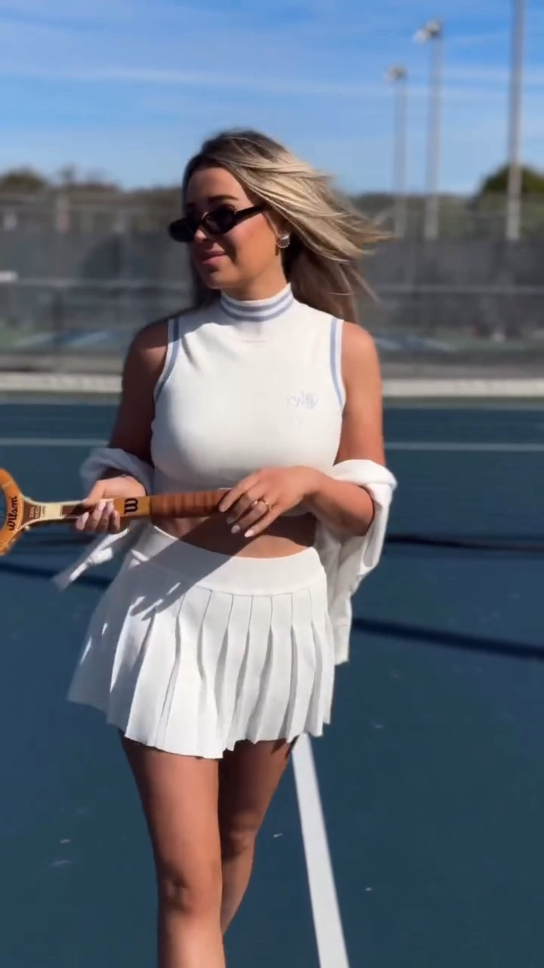 90s tennis outfit | white tennis skirt and mock neck top set
90s inspired tennis outfit with a fitted mock neck top and pleated skirt. Perfect for court days or a sporty vintage look. 🎾🤍
By Wiskii Active - Use code LULA for 15% off

#tennislook #tennisskirt #activewear 

#LTKActive #LTKSeasonal