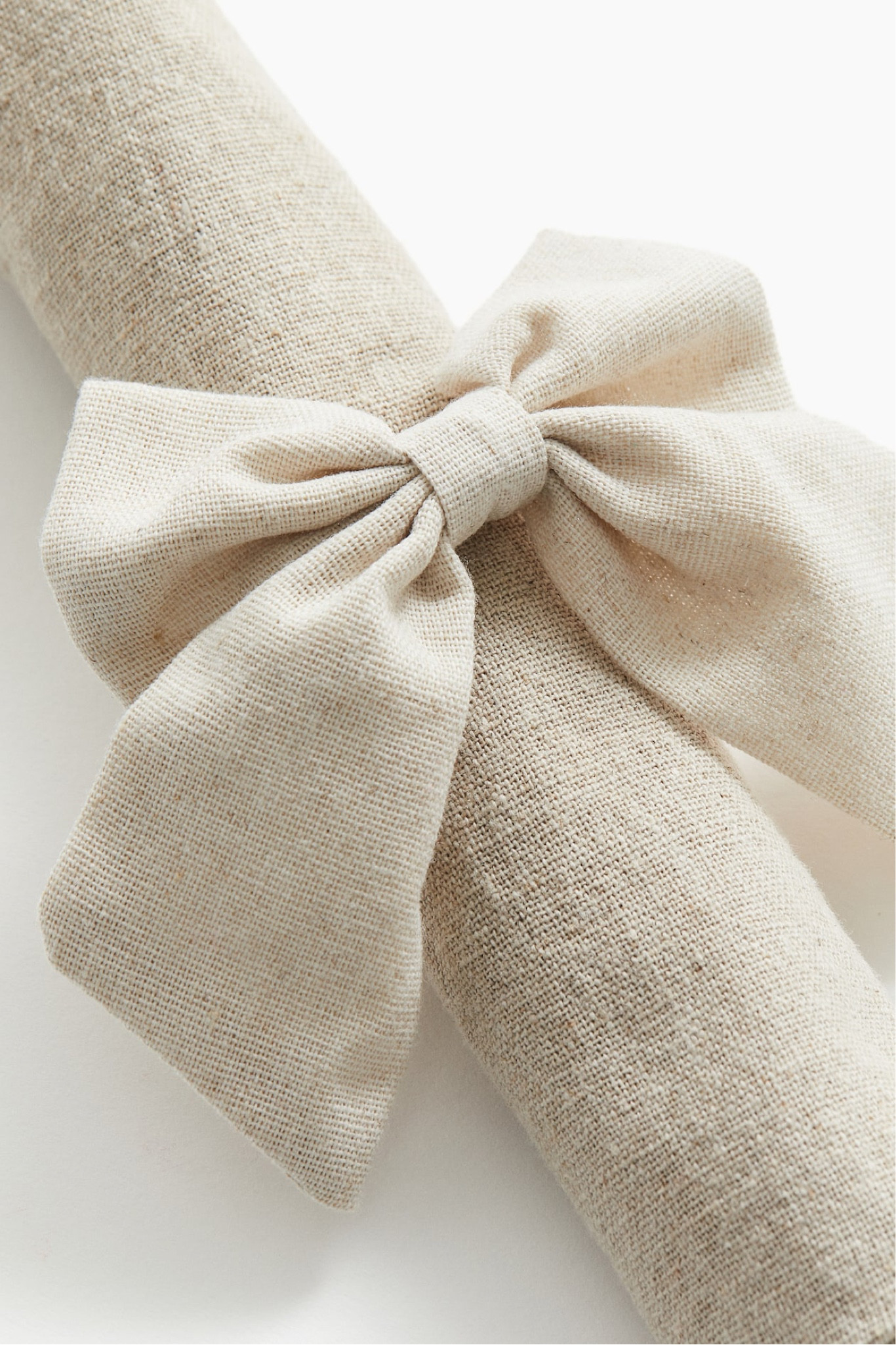 Neutral bow napkin ringsnow

#LTKHome #LTKSaleAlert #LTKFindsUnder50