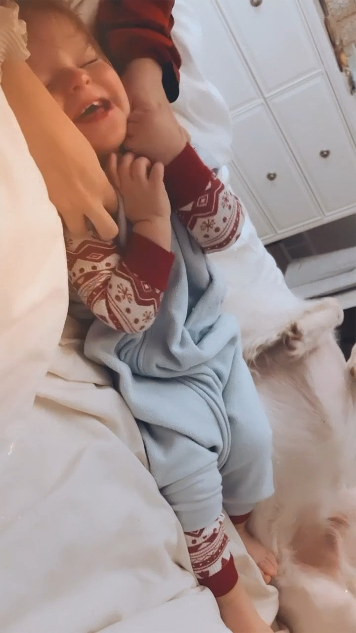cozy little January friday mornin’ - still in our Christmas jammies 🫶🏽♥️ - with giggles and lovin’ from Red man 🐶🤍👼🏼

#LTKbaby #LTKhome #LTKfamily