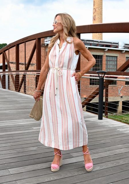 This easy breezy summer dress from Etcetera combines pink and orange stripes with shimmering gold thread and feels like a sunset!  It has a rope belt and flattering halter neckline!  I’ve styled mine with pink espadrille sandals and a gold bag!


#LTKStyleTip #LTKShoeCrush #LTKSeasonal