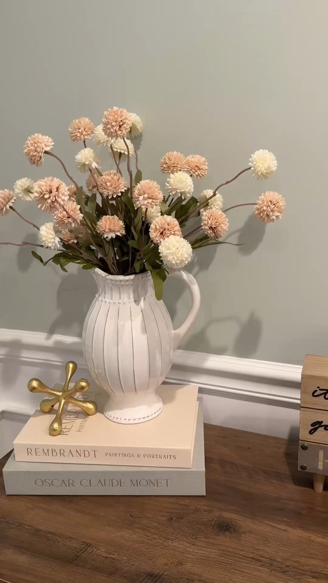 Styling dining room cabinet with these gorgeous faux silk mums in a white pitcher. 
Those are faux books with hidden storage as well.

The cabinet is from Wayfair! Farmhouse style looks inspo for home

#LTKSaleAlert #LTKHome #LTKvlog