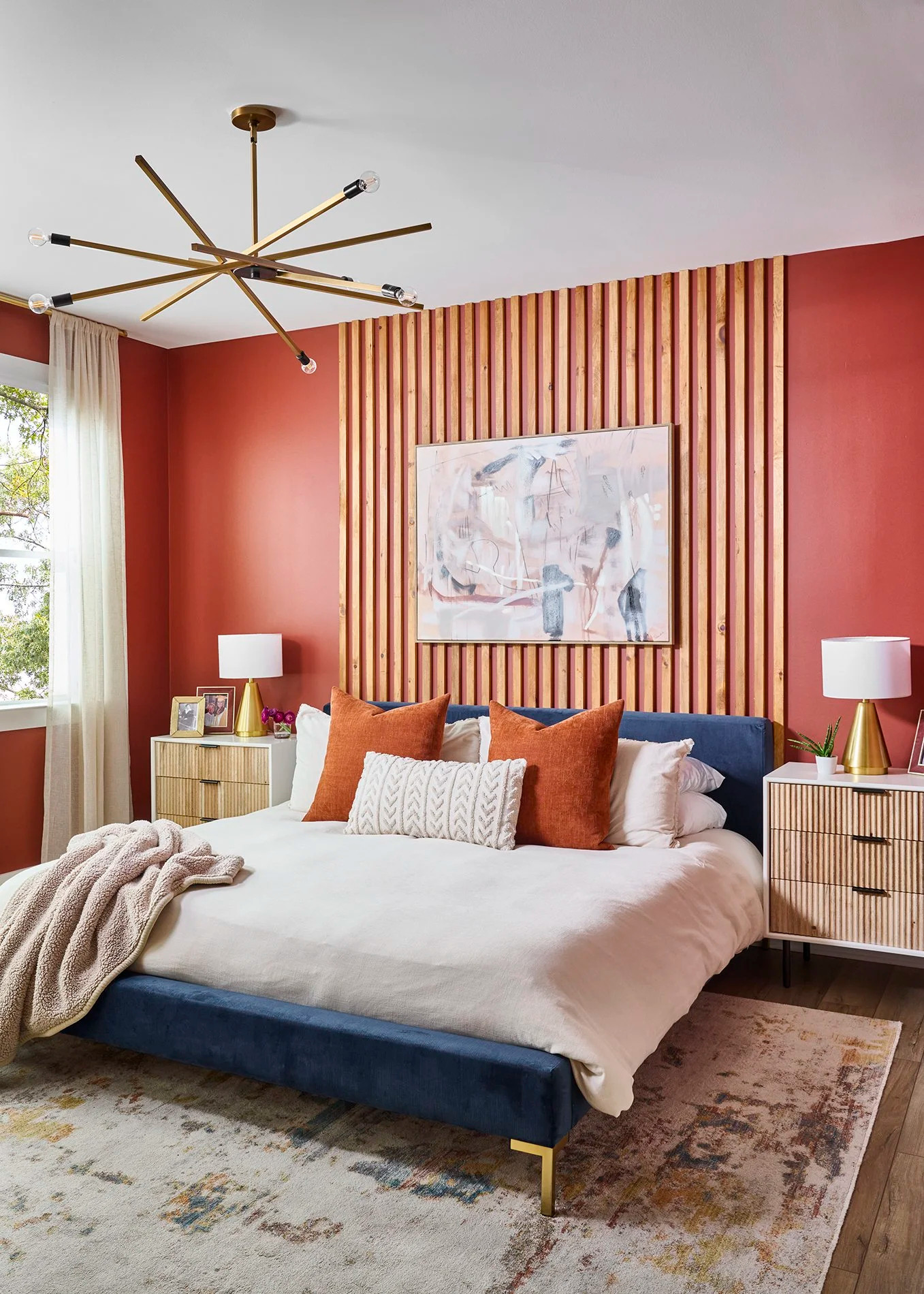 🤎 Rest looks even better in a bedroom designed to restore your soul. Warm terracotta walls, rich wood slats, and soft layered textures create a cozy retreat that's equal parts bold and calming. Your bedroom should be your favorite place to recharge. 

 #SundayRestDay #LTKHome