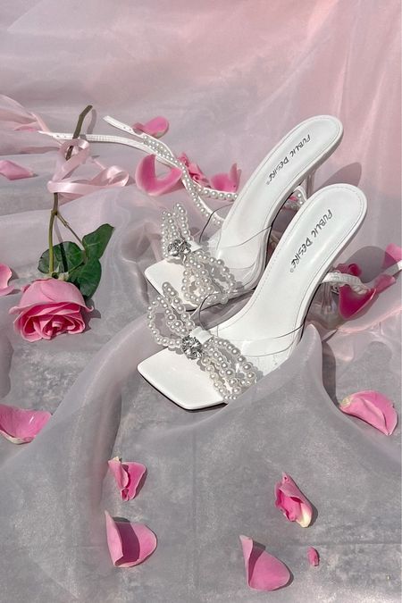 Pearl bow heels 🎀

#LTKfindsunder100 #LTKshoecrush #LTKHoliday