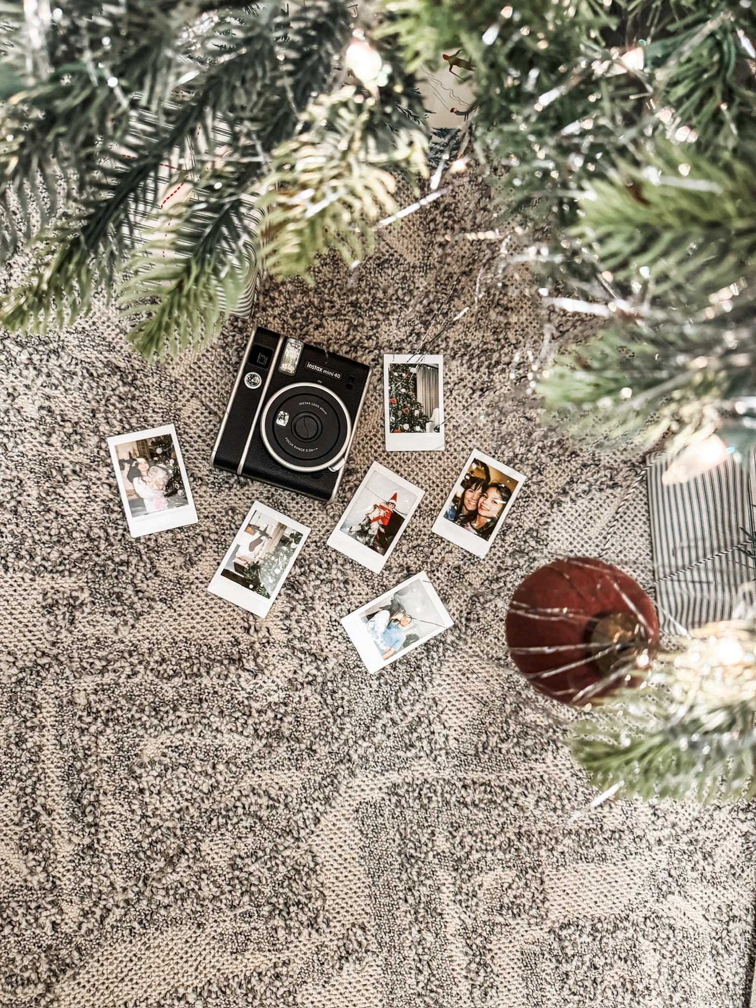 This holiday, the Instax Mini 40 is helping me freeze all the little moments ❤️ From tree decorating to Elf surprises, these Polaroids tucked under the branches (with the prettiest ornaments and the softest rug underneath) are everything.
#eanesinteriors #instaxmini40 #holidaytraditions #christmasdecor #polaroidseason



#LTKstorytime #LTKdayinmylife #LTKHoliday