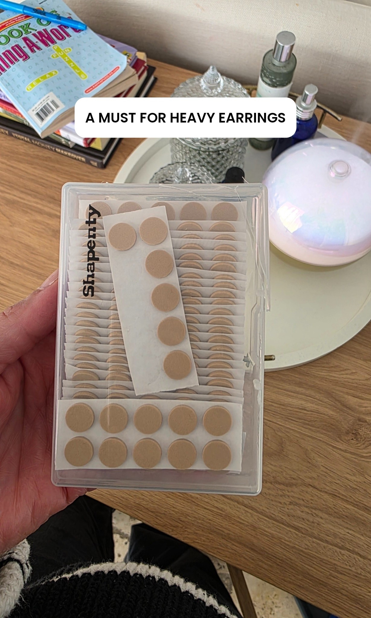 These are a fav. They stick well and are comfy. 

Earring support patches