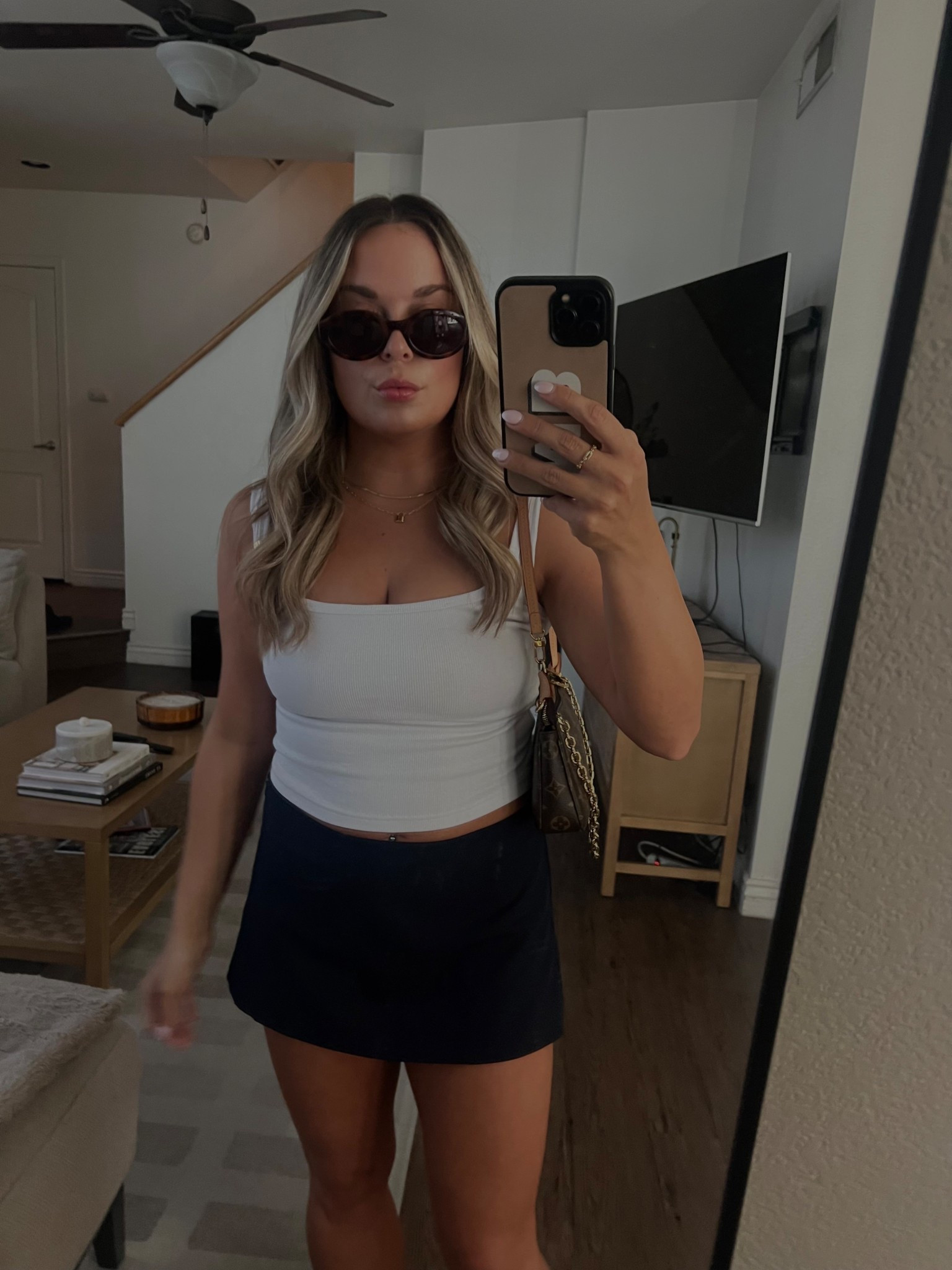 Aritzia skort
Aritzia flame skort
Fall transition outfits
Aritzia fall
Fall outfits 
Mini skirt
White tank top 
Gorjana
Gold jewelry
Gucci sunglasses
Oval sunglasses


#LTKPetite #LTKSeasonal #LTKFindsUnder100