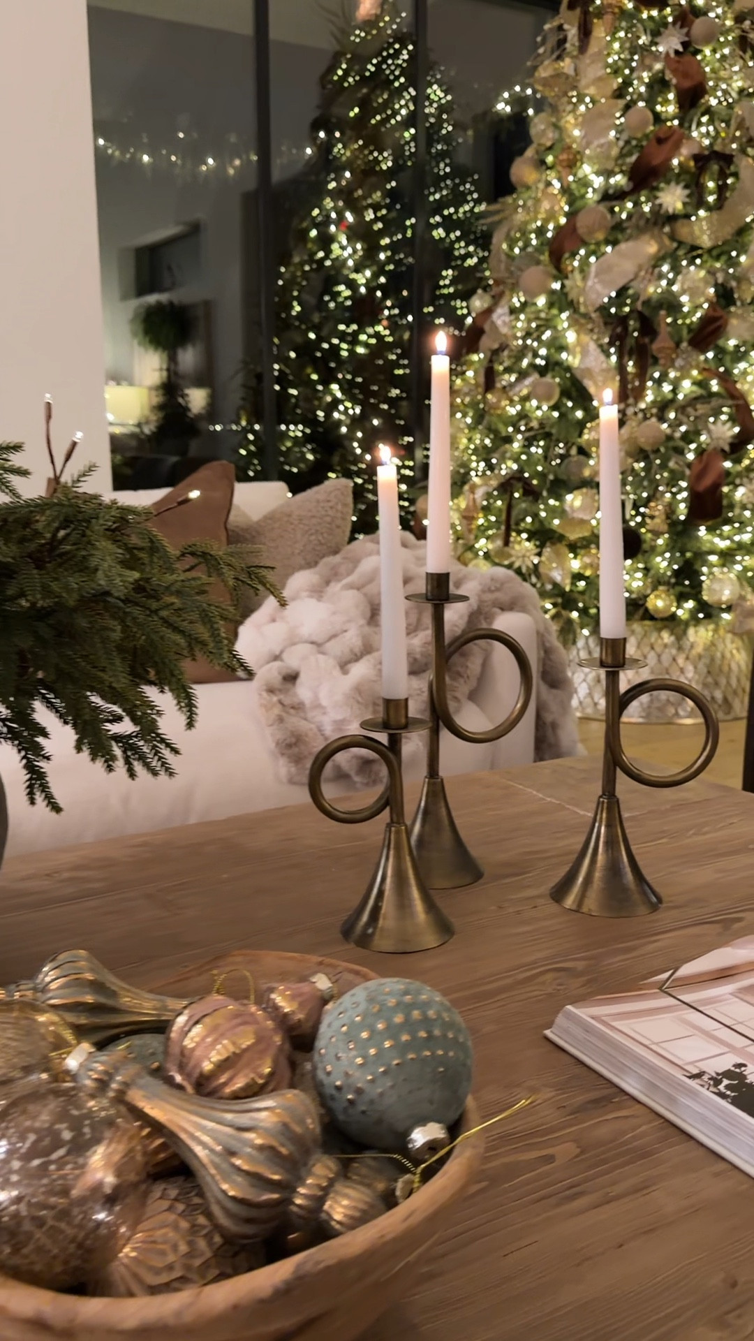 These sculptural brass candlesticks are finally back in stock at Wayfair, and they’re one of my favorite little statement pieces this season. They bring so much warmth and dimension to our holiday living room — especially at night with all the tree lights glowing.

I paired them with our solid wood coffee table from Eternity Modern, which has that soft, lived-in texture that makes every vignette feel extra cozy.

If you’ve been waiting on these candlesticks, now’s the time — they sell out fast every single round.

Wayfair candlesticks, brass taper holders, holiday decor ideas, Christmas living room decor, coffee table styling, Eternity Modern coffee table, cozy home styling, neutral holiday decor 

#LTKSaleAlert #LTKHoliday #LTKHome
