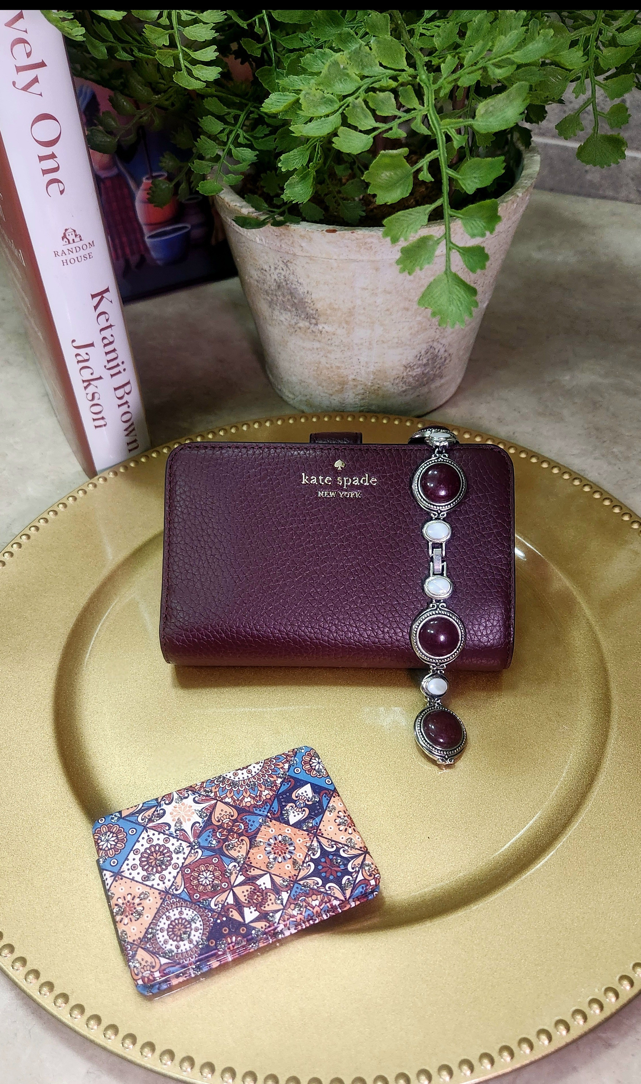 Fav accessories Kate Spade wallet, Lia Sophia link bracelet, compact mirror 

