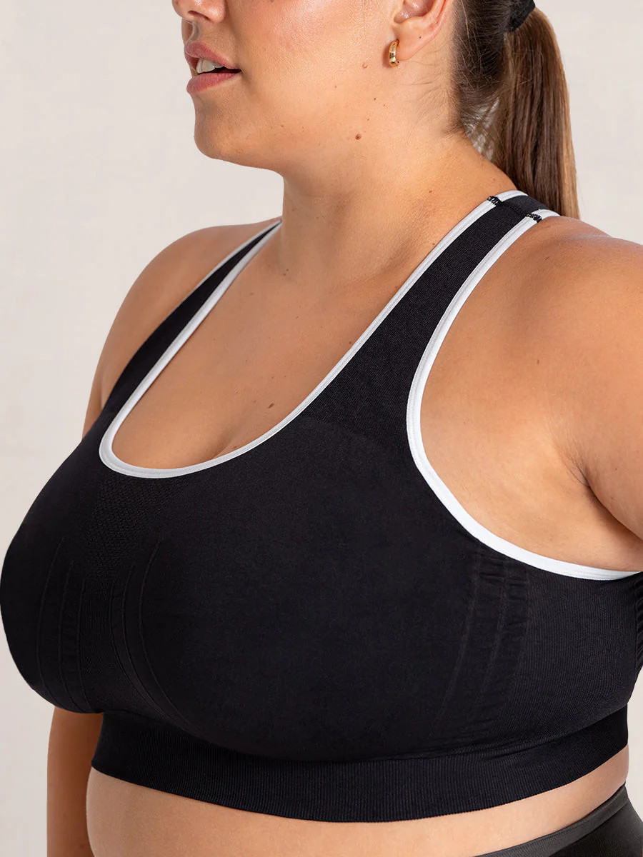 Truekind® Seamless Racerback Sports Bra | Shapermint