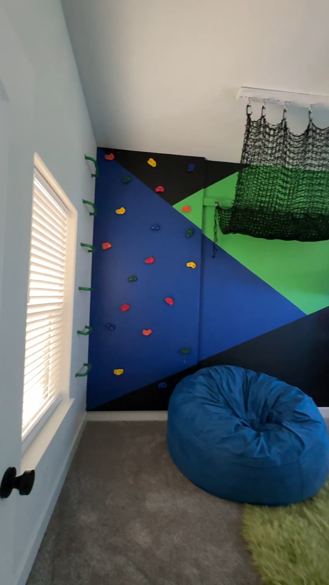 DIY rock climbing wall neon green/black/blue inspired boys room 💚

#LTKKids #LTKHome #LTKFamily
