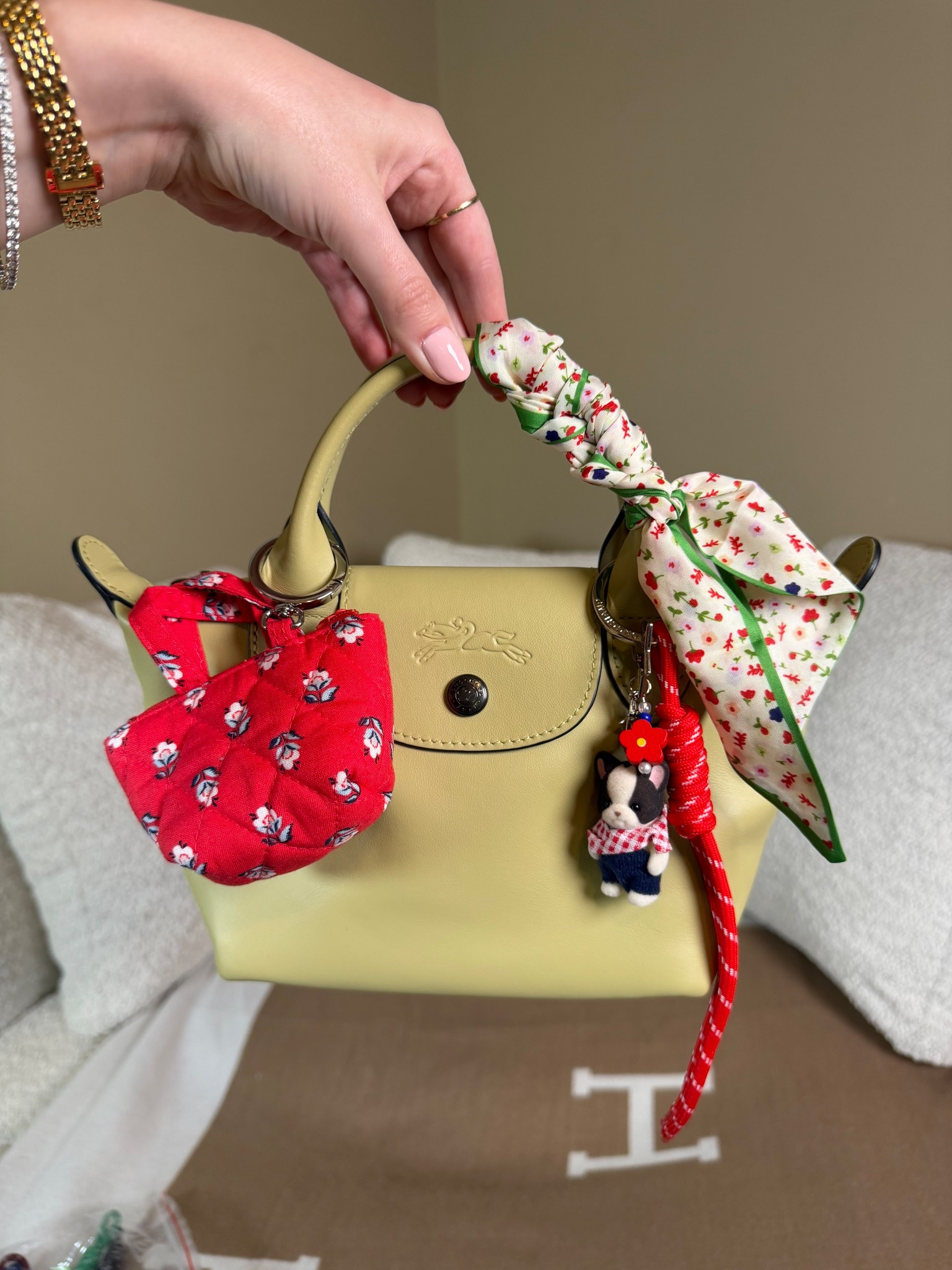Longchamp Le Pliage xtra extra small all leather bag in the color pistachio.
The perfect summer color
Vera Bradley mini bag charm
Corded charm
Frenchie calico critters charm