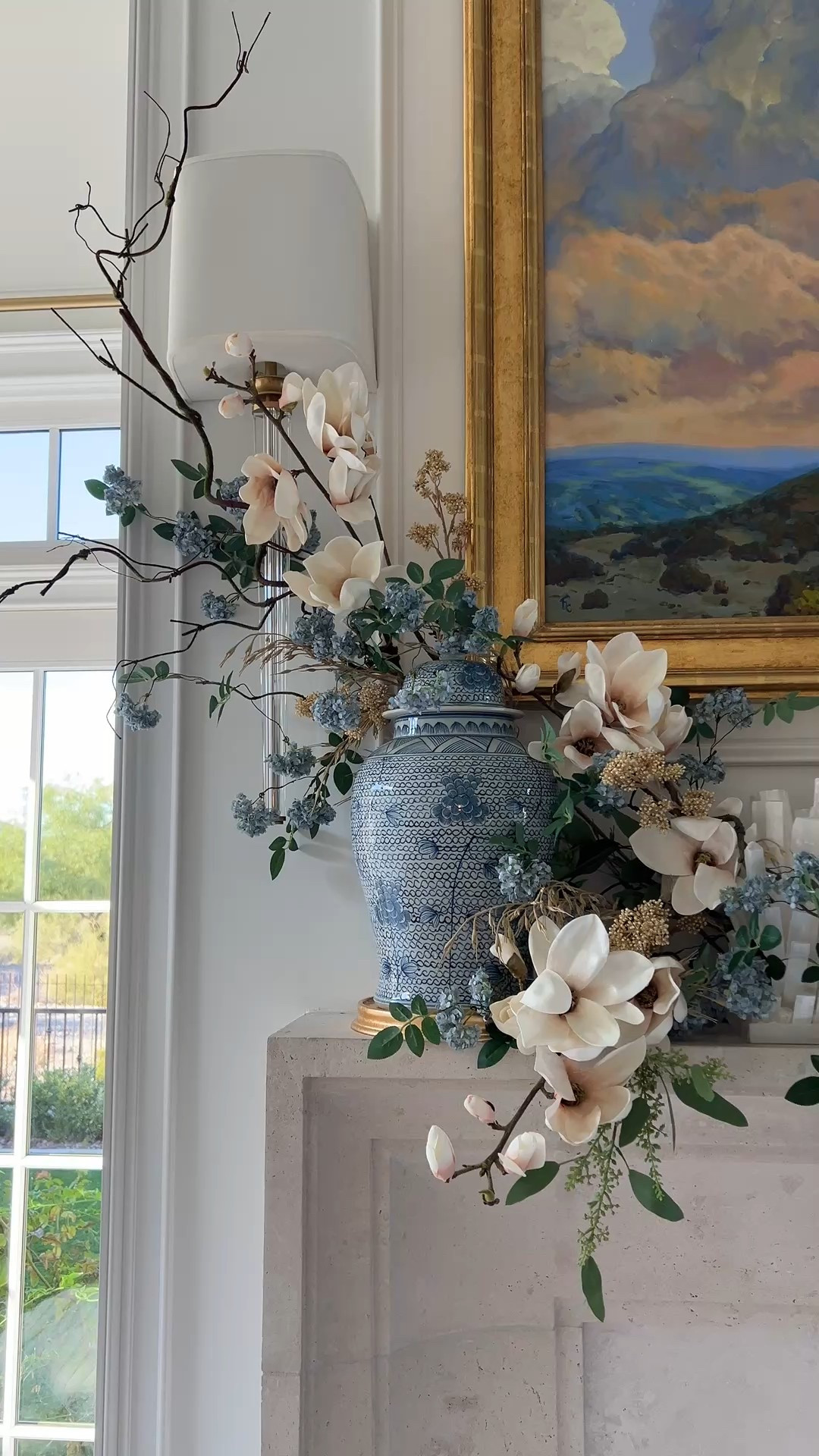 My whimsical fall mantel! 

I used…

5 magnolia stems
2 curly willow branches
6 blue hydrangea branches 
5 wheat stems
7 sedum stems 
5 green seeded eucalyptus 