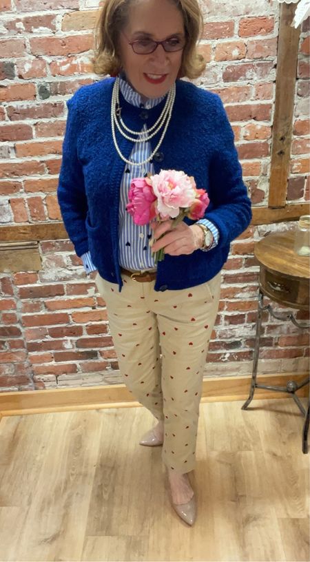 How fun are these chinos with red hearts ❤️ on them? Blouse with 💙 hearts.  I added a blue cardigan - strand of freshwater pearls and nude heels to dress this #ootd. Follow me for more fun looks.  Shop this look.  💞💞💞

#LTKsalealert #LTKstyletip #LTKover40