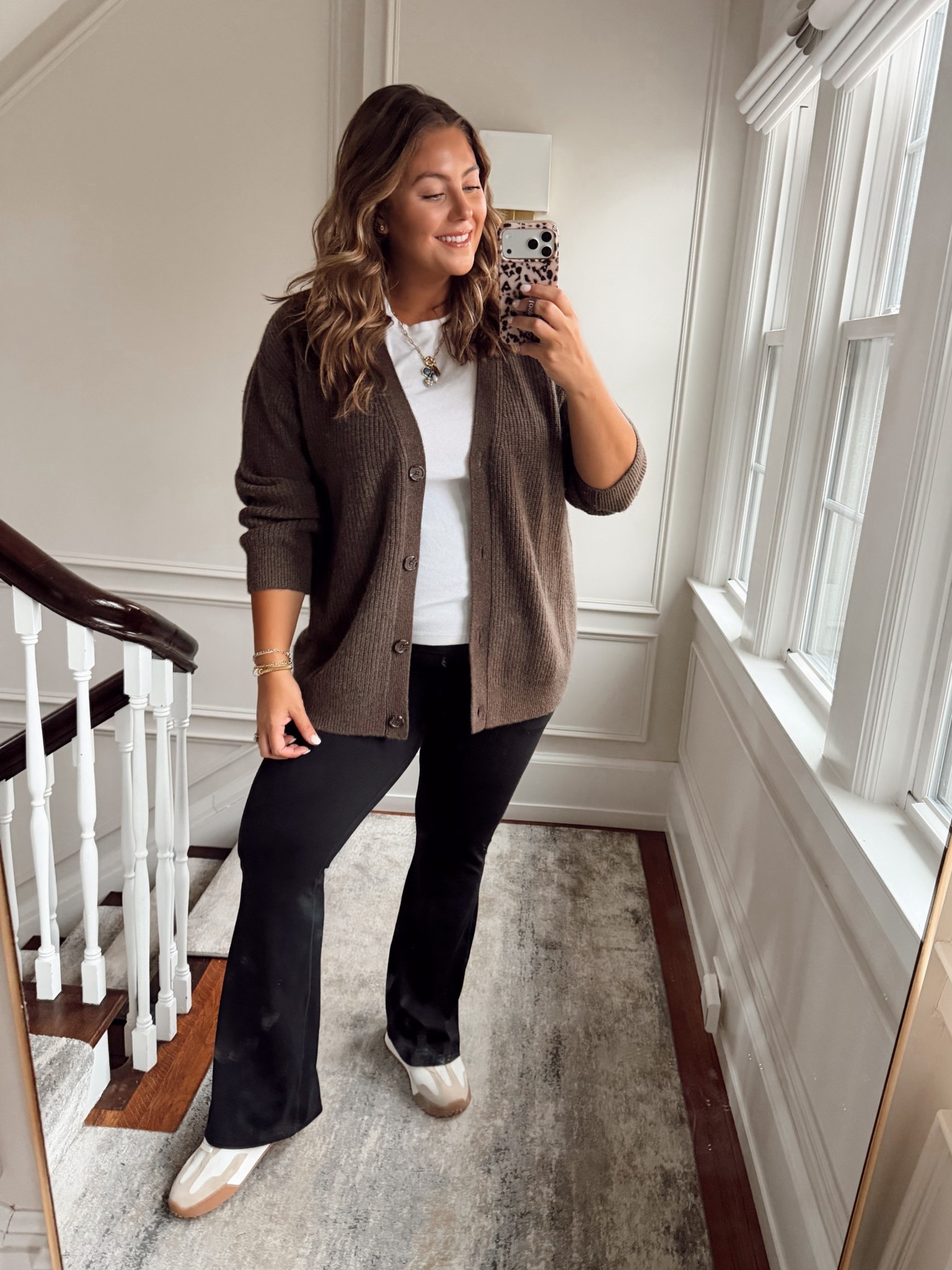 This cardigan is a most loved of 2025, comes in plus and standard sizing. I’m wearing 1X. Wearing XXL Tall in t-shirt, XL in flare leggings. 

#LTKFindsUnder100 #LTKPlusSize #LTKSeasonal