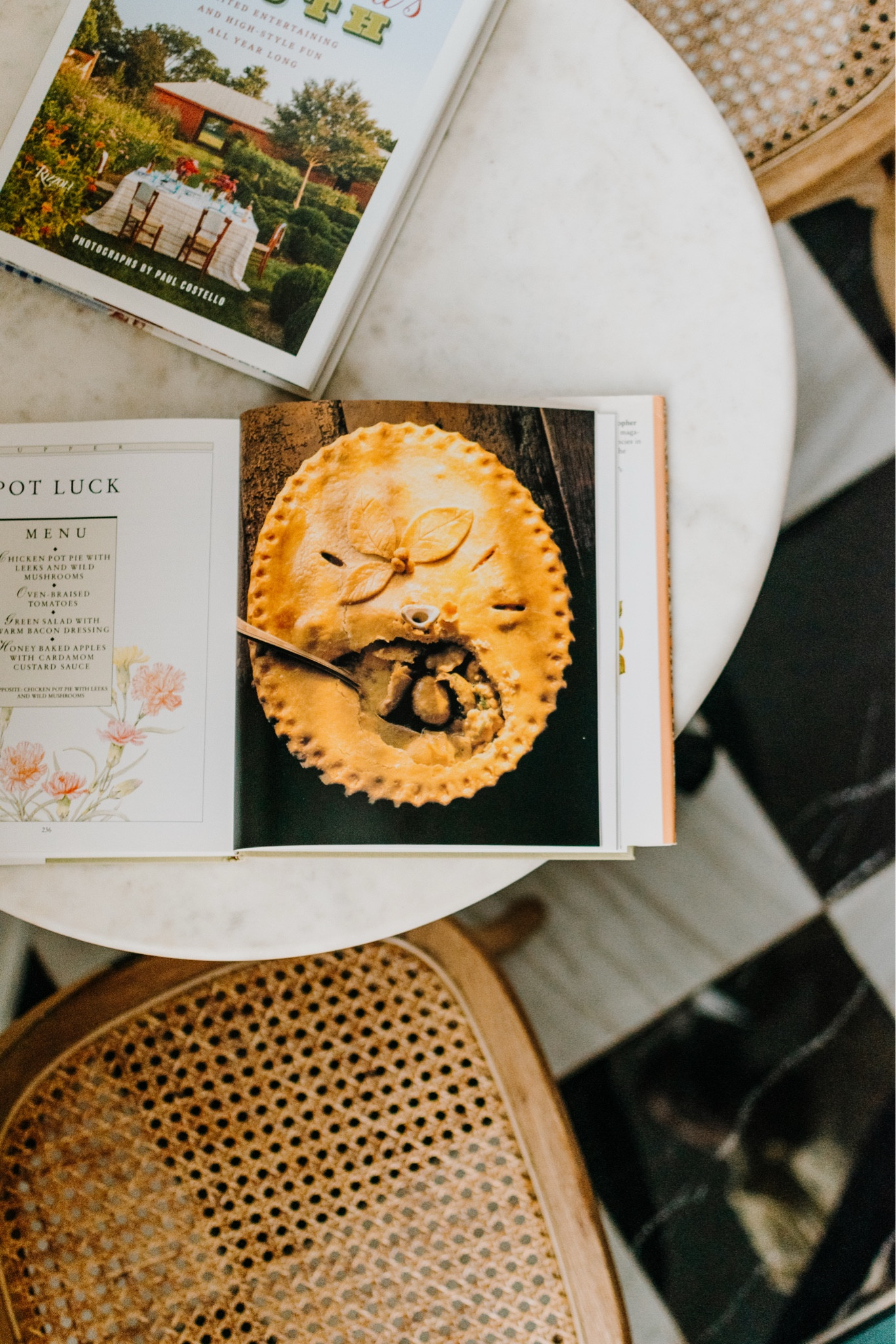 I’m currently flipping through the well-worn pages of my cookbooks, scribbling down notes on a hotel notepad (one of the amenities I *always* take from a memorable stay), and finalizing recipes for my next dinner party. Which means it’s a fitting time to share a few of my favorite cookbooks to crack open when I’m hosting...

• Crabtree & Evelyn Cookbook: This is the most charming illustrated cookbook that I found in a Little Free Library a few years ago. It’s out of print, from the 80s, but the menus are just as relevant today, and the book itself has the most delightful cottage-inspired vibes.

• Julia Reed’s South: I’d love to have a reputation for throwing the most spirited of parties, so it only makes sense I would come back to Julia Reed’s cookbooks again and again. The stories and the imagery are as good as the recipes — I swear I’ve looked at the pages dedicated to her Christmas party more times than I can count.

• Ina Garten Cooking for Jeffrey: Can’t you just hear Ina’s voice as you say the title, Cooking for Jeffrey? Shockingly, this is the only Barefoot Contessa cookbook I own, but it’s full of simple, delicious classics.

• The Southern Living Cookbook: I have a funny story, which I won’t tell here, but it’s reminiscent of the Father of the Bride blender scene. Regardless of my initial reaction, however, this is possibly my most-used cookbook, with over fifteen years of dog-ears across its 500 pages.

• The Southerner’s Cookbook: Y’all know I’ll take anything Garden & Gun publishes as Bible, and this cookbook is no exception. Unfortunately, it’s at the river, but that’s where it should be — if you’ve stayed at the cottage, you know I’ll flip open this cookbook and make biscuits at least one morning.