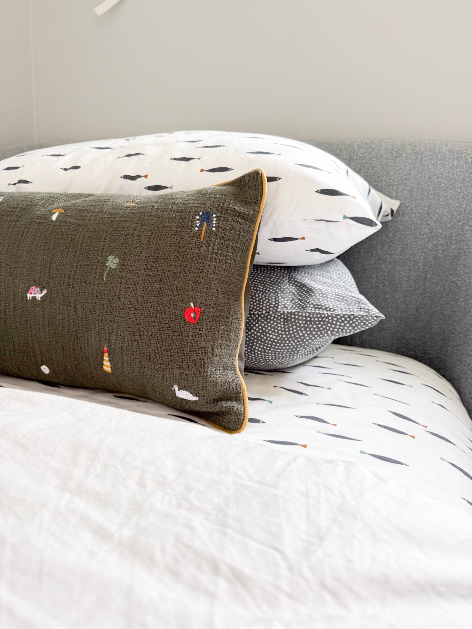 This bedding mix is such a fun way to make a boys’ room feel playful without looking too young. I love the fish print, subtle pattern mixing, and embroidered pillow for a collected look that can grow with them.

boys bedding, kids bedding, boys bedroom decor, patterned bedding, embroidered pillow, kids room inspiration, shared boys room, playful bedroom design, layered bedding, timeless kids decor, bedroom styling, girlonthehudson

#LTKHome #LTKKids #LTKmomlife