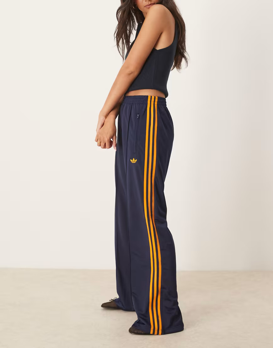 adidas Originals Firebird track pants in navy and orange | ASOS (Global)