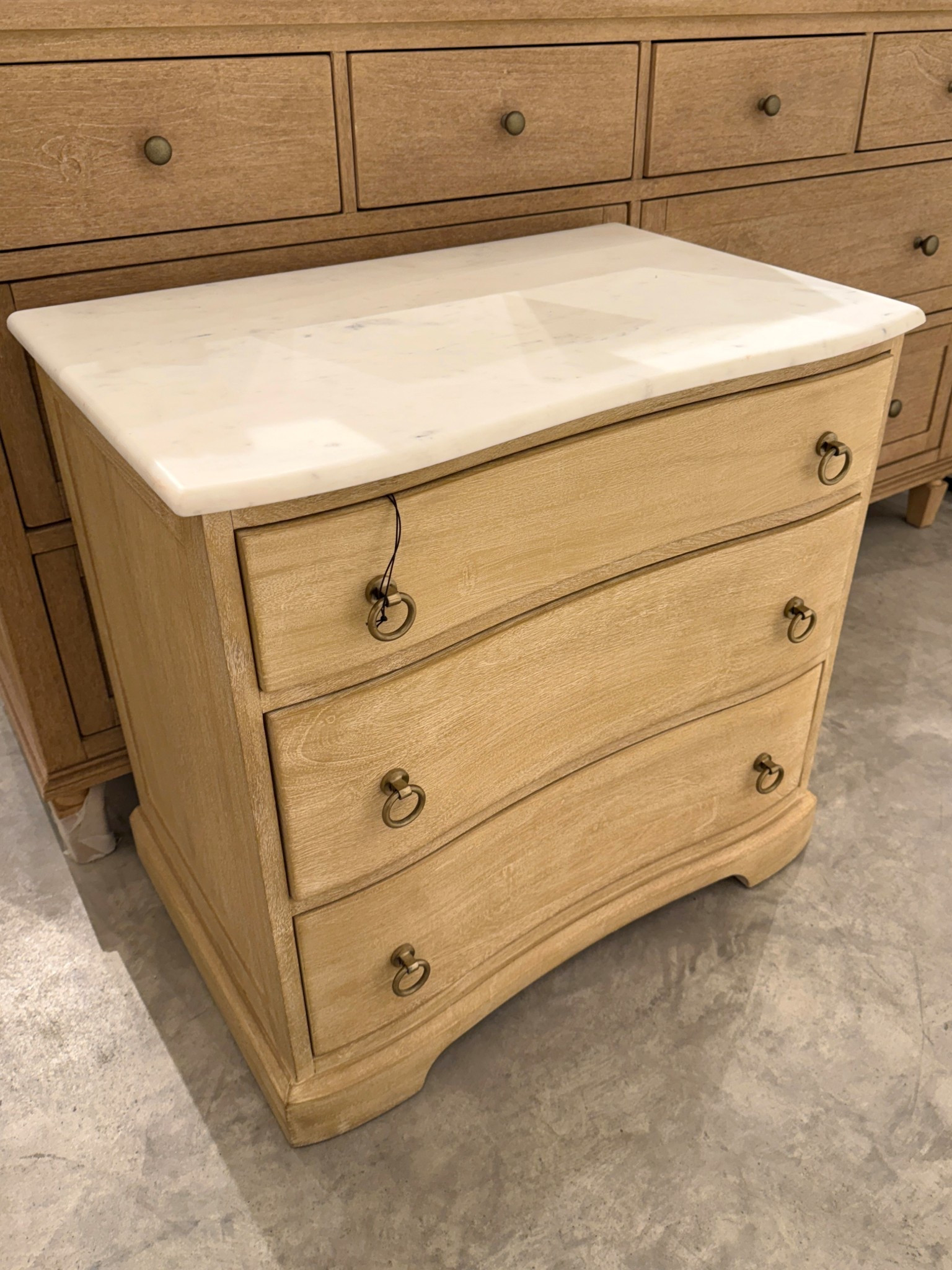 Just spotted Pottery Barn’s best-selling Scarlett Marble Nightstand in the Light Weathered Wheat finish and it’s stunning!🤩 I honestly hadn’t seen this shade anywhere until now—such a beautiful, almost blonde wood tone and even lovelier in person. 🫶🏻 The classic frame paired with the marble top feels quietly luxe, and the three spacious drawers are thoughtfully made with English dovetail joinery and smooth metal glides. A timeless bedside piece that elevates the whole room! ✨ I’ve linked other gorgeous nightstands and coordinating pieces from this collection as well. ☺️ #PotteryBarn #BedroomInspo  #BedroomFurniture

#LTKSaleAlert #LTKHome #LTKGiftGuide