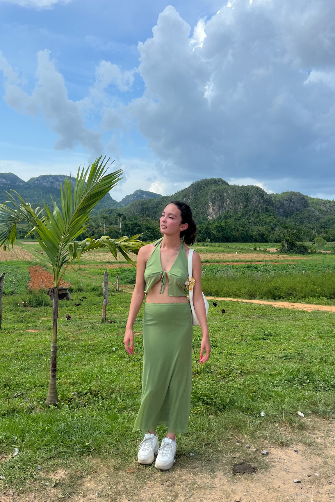 Princess Polly code: ANYA20

green halter top with tie front + maxi skirt 

princess polly: size 2

height: 5’3