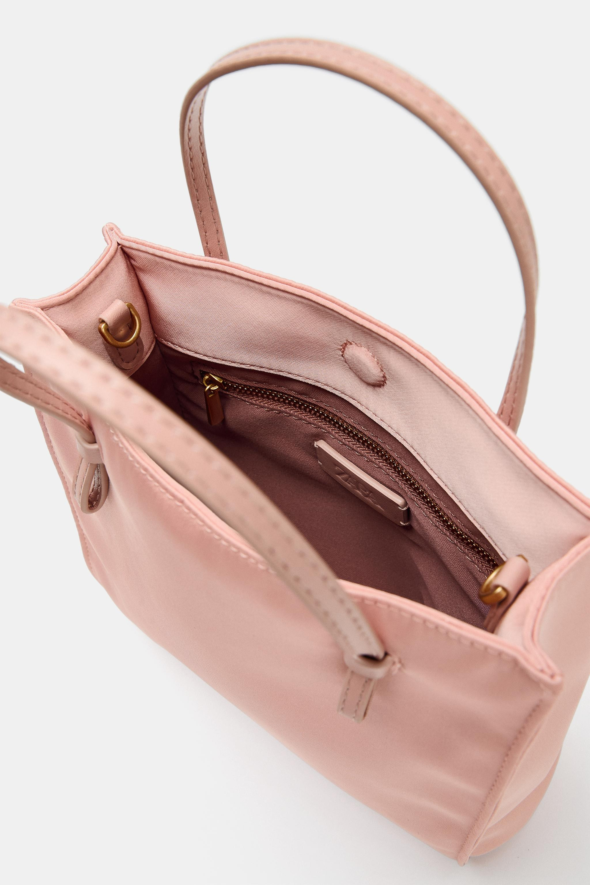 Mini shopper handbag. Satin effect exterior. Double handle and detachable crossbody strap. Interi... | Zara US
