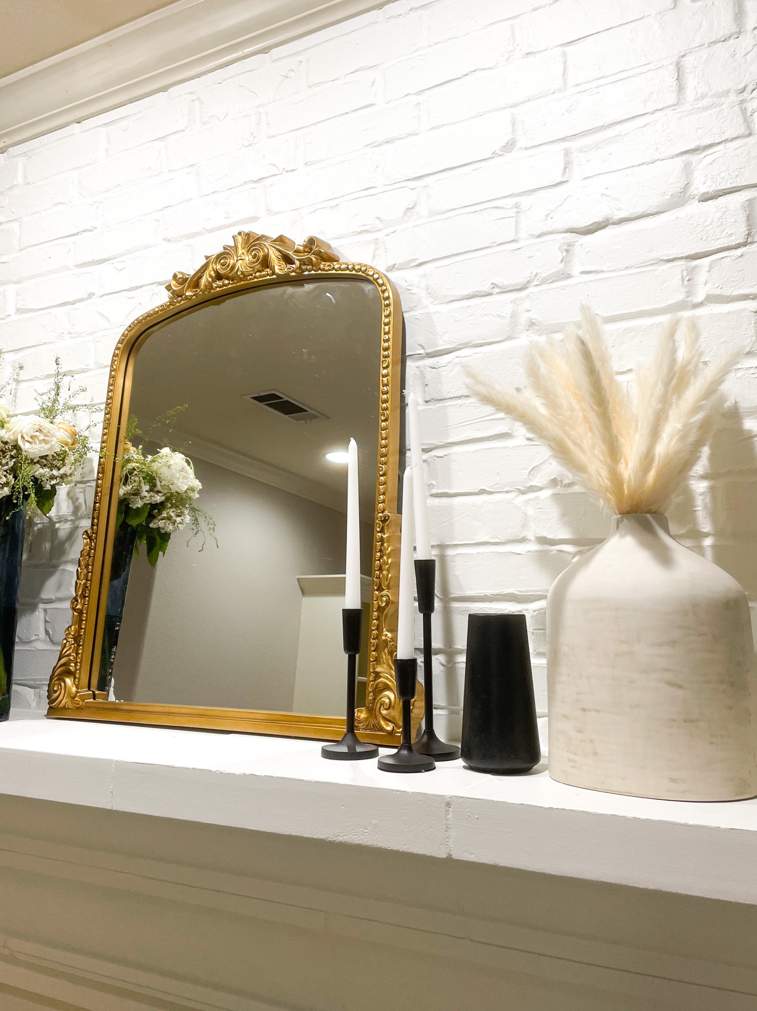 Obsessing over my mantle decor & my new gold antique mirror 

#LTKFind #LTKunder100 #LTKhome