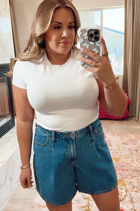curvy spring denim shorts look! wearing size xl in fitted white cropped tee and size 33 for 90s shorts for a looser look 

#LTKcurves #LTKSeasonal #LTKunder100