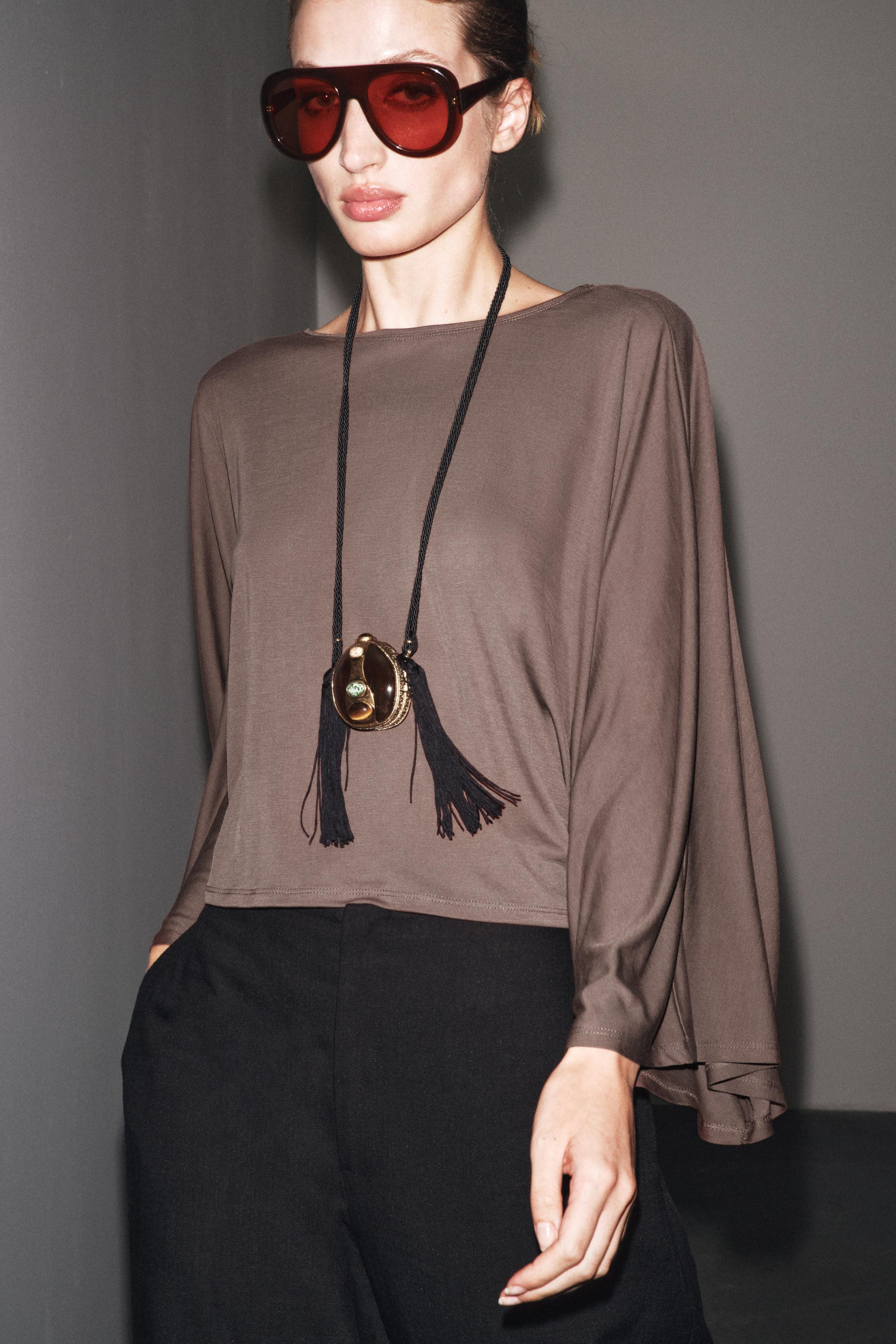 ASYMMETRIC FLOWY CAPE$ 35.90 Black Anthracite grey taupe browntaupe brown | 0858/699/707Add to ca... | Zara US