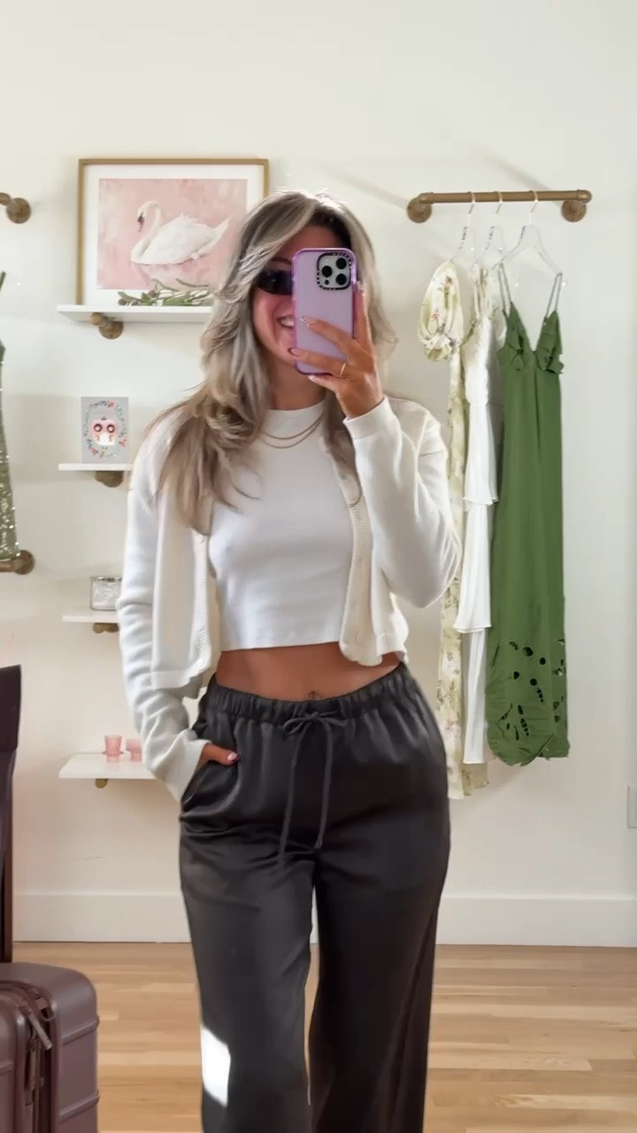 Brown satin pants white baby tee and cream cardigan airport travel outfit for today

Electric picks code: emerson20

Wearing my usual small/2 xs in white tee

Travel
Airport outfit
Satin pants
Comfy travel
Cream cardigan
Destination
Luggage
Suitcase 
Nighty

#LTKTravel #LTKCon #LTKStyleTip