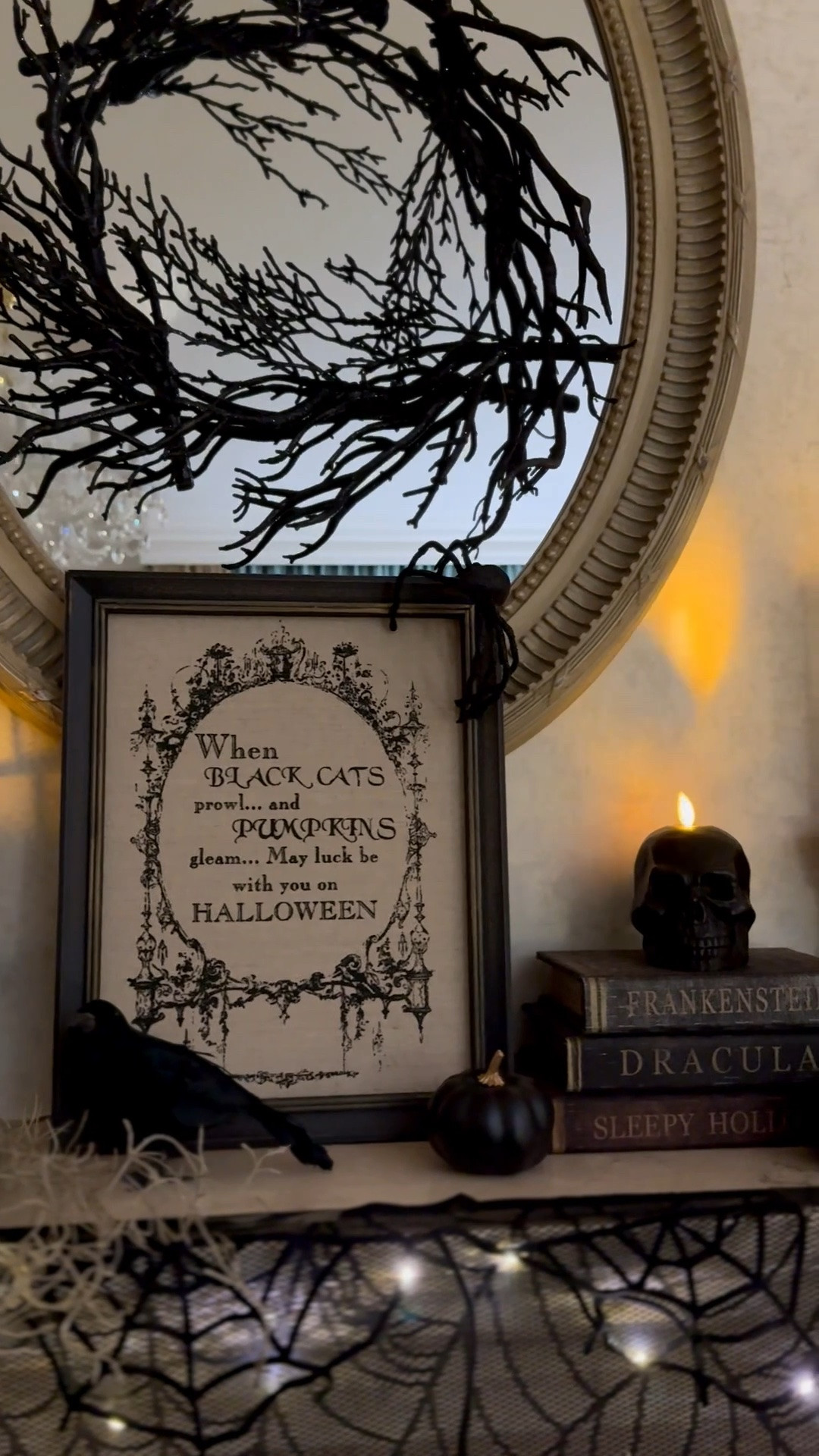 Halloween home decor, Halloween living room mantel, @Michaels Halloween decorations, skull candle, decorative crows