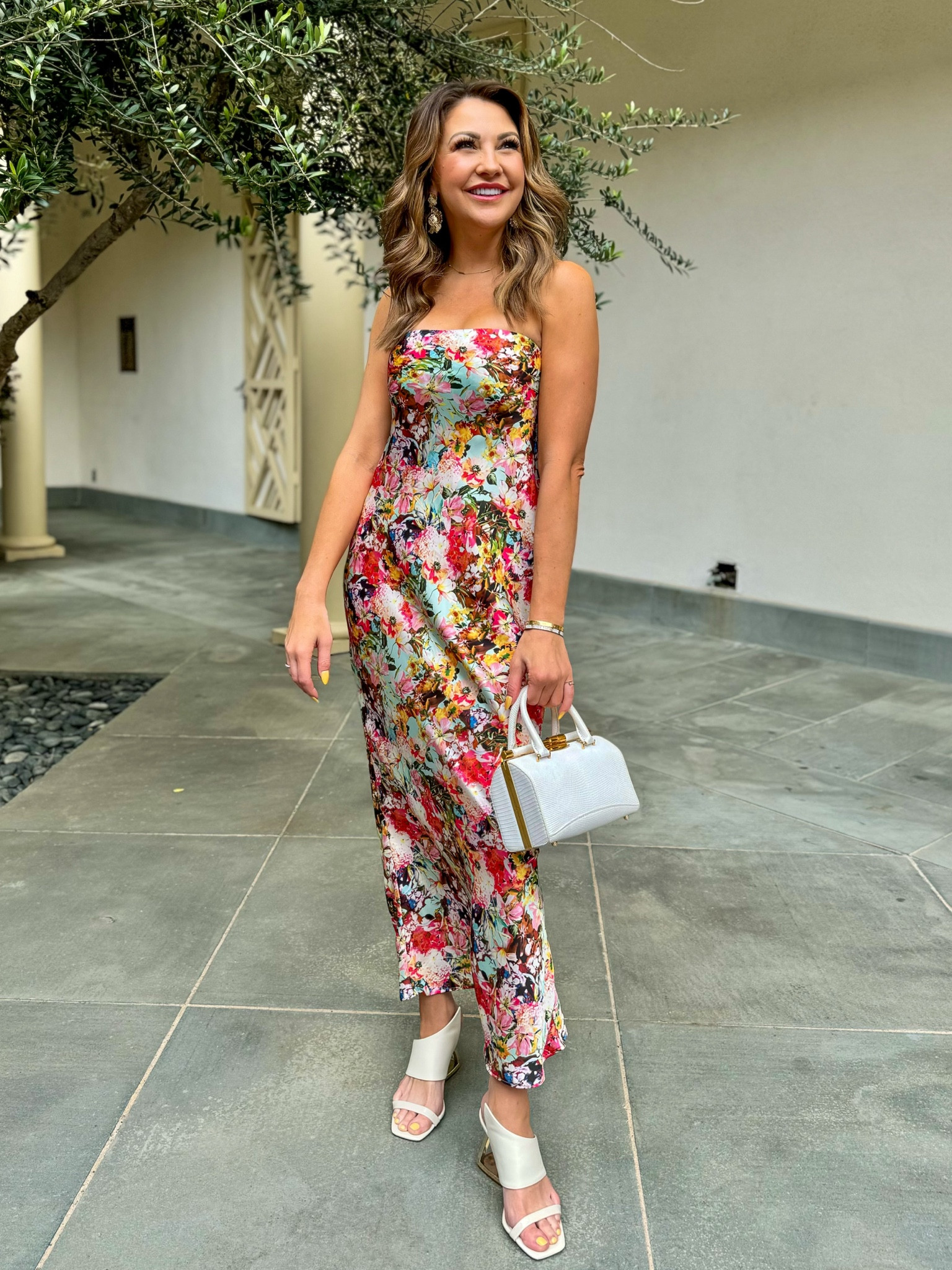 My favorite statement gold earrings (with some bling) that look great with cocktail & evening gown dresses! 
I lovvvve these white sculptural heels. Comfortable, stylish, and a fantastic price point!



#LTKParties #LTKShoeCrush #LTKWedding