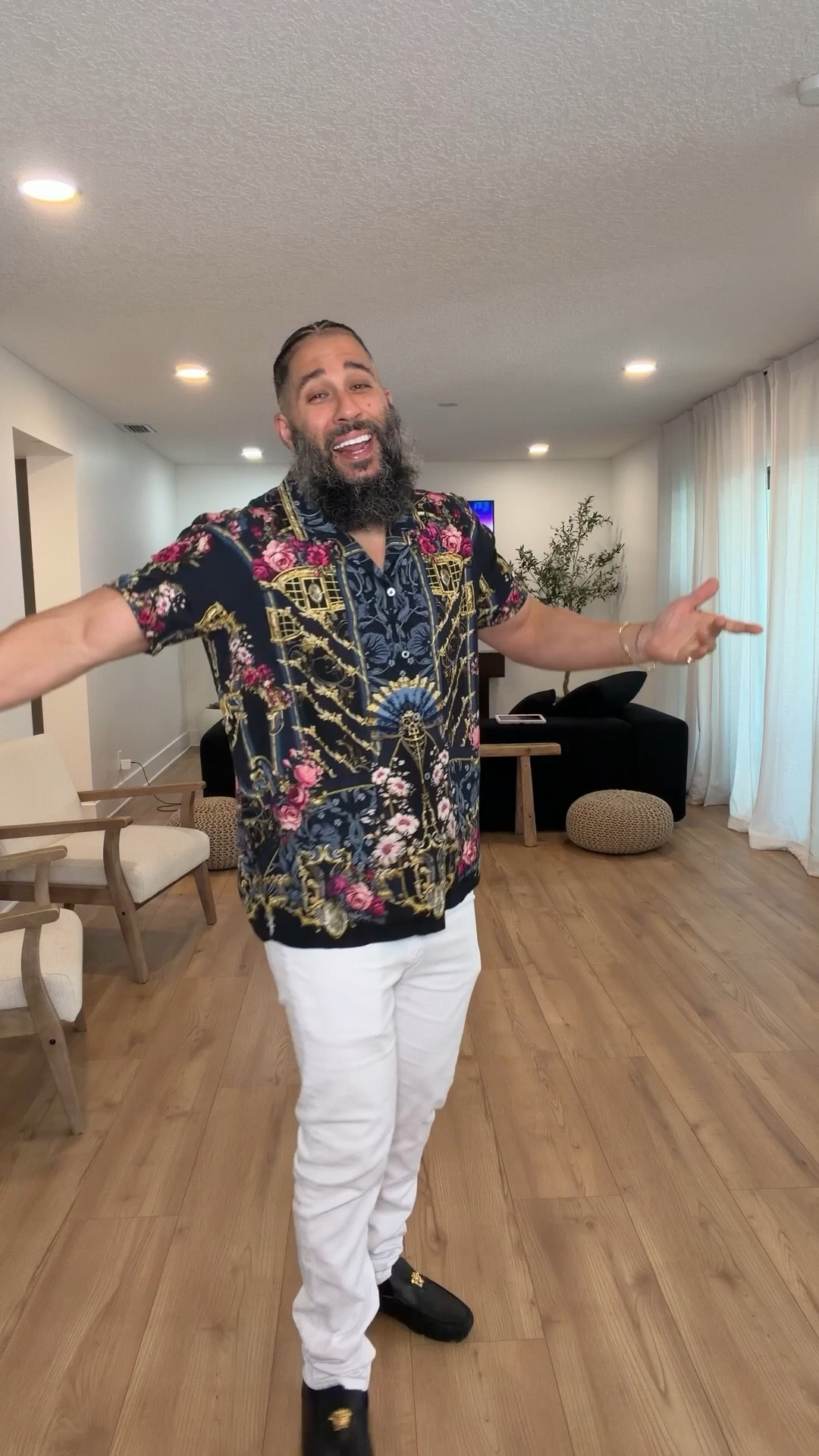 Scroll to shop this men's outfit featuring a bold printed short sleeve shirt styled with crisp white pants and classic black loafers for a polished statement look. The rich pattern adds personality while the clean white denim keeps the outfit sharp and modern.

Perfect for date nights, vacations, summer events, or an elevated casual night out.

5'4" | 138 lbs | 34D bust | 27" waist | 40" hips

#LTKvlog #LTKootd #LTKSpringSale