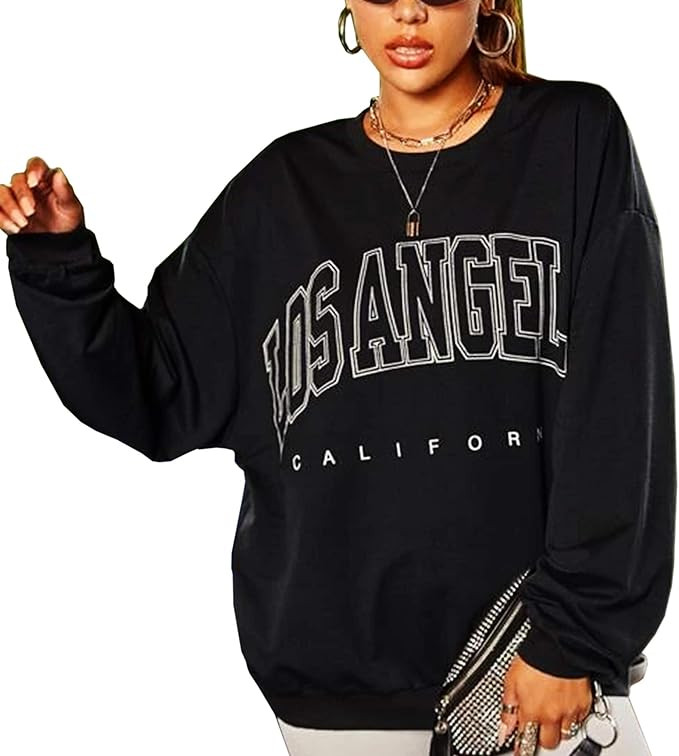 SAFRISIOR Women’s Drop Shoulder Letter Print Pullover Crew Neck Long Sleeve Sweatshirts | Amazon (US)