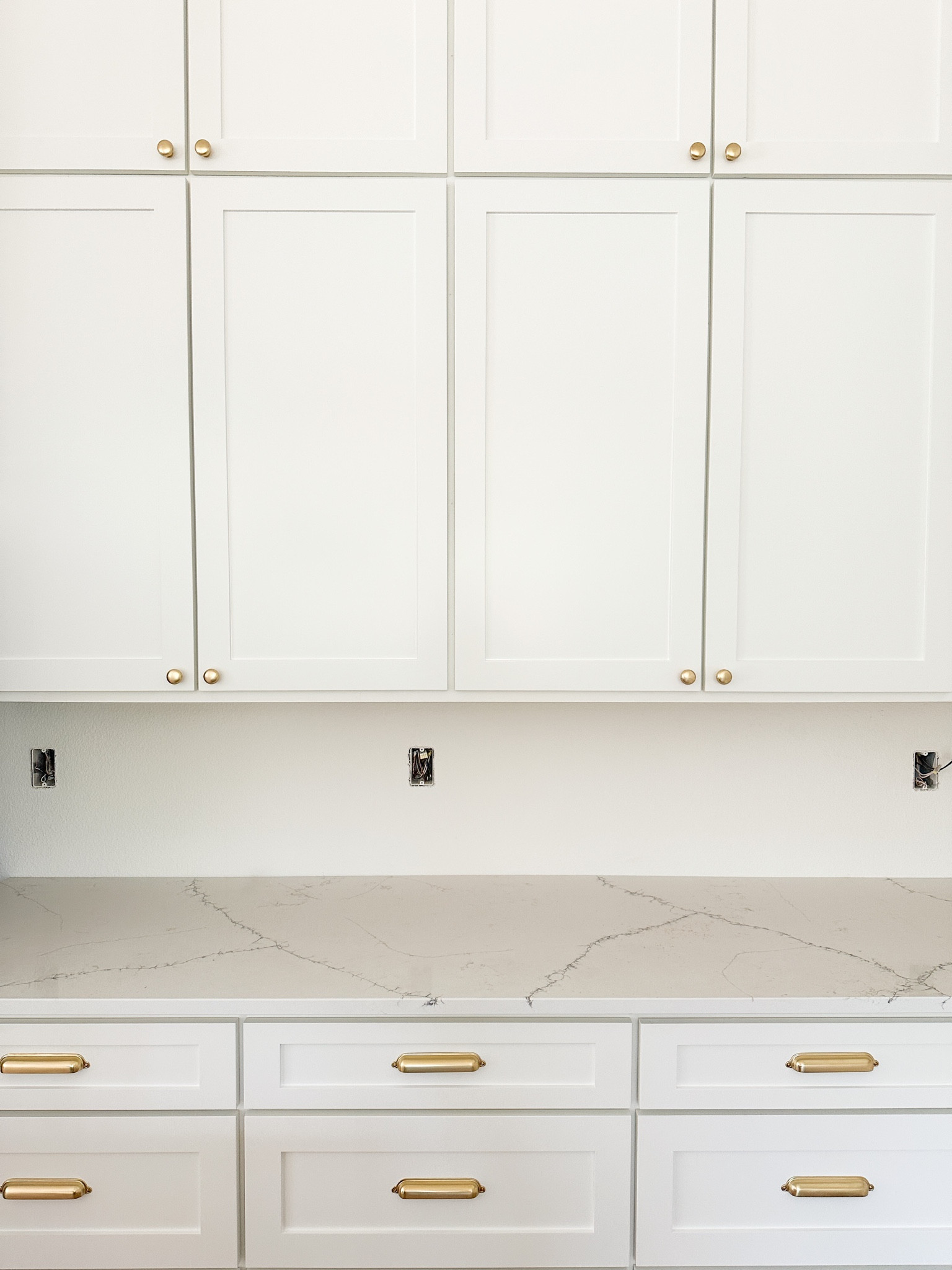 Our kitchen hardware.  I chose the aged brass finish  (If we had had different style cabinets, I would have loved to use the cupboard latches)  