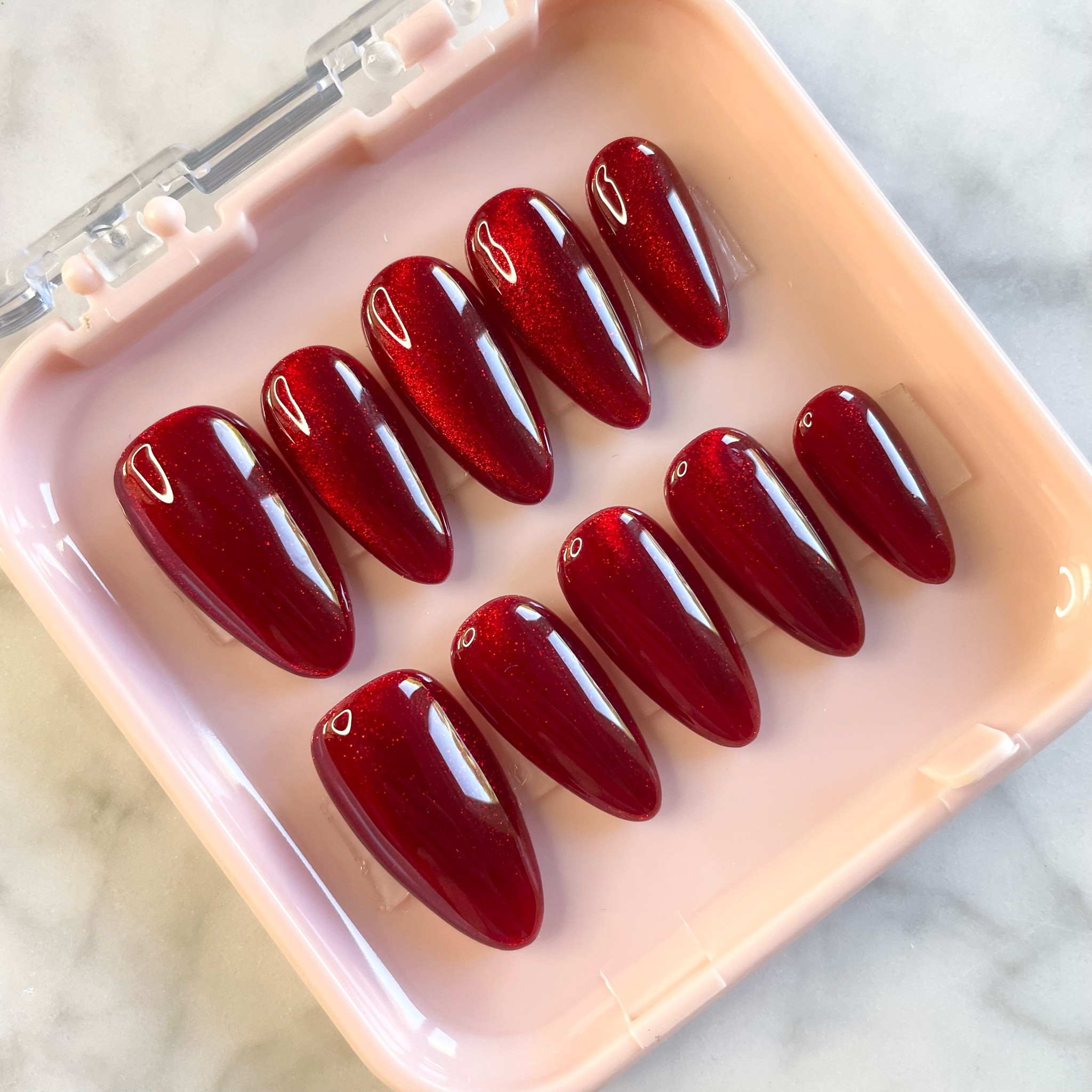 Red cat eye press on nails, red nails, almond press on nails, red nails, date night nails

#LTKparties #LTKFestival #LTKbeauty