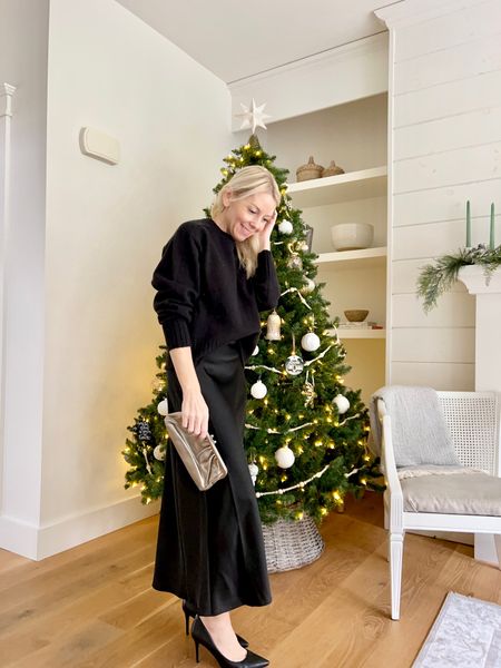 Tis the season to get festive! Love this black satin skirt simply paired with a black sweater! Classic, timeless holiday style! 

#holidayoutfit #blacksatinskirt #outfitinspo #partyoutfit 

#LTKHoliday #LTKparties #LTKover40