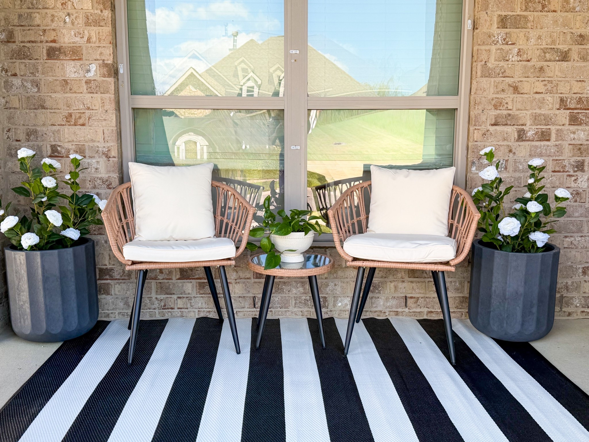 Front porch spring refresher feels so good!! Can you believe these beautiful camellia flowers are fake!? And these planters are continually selling out, so grab them now! They come in this graphite, a marble tone or brown stone and they’re light! This is your sign to refresh your porch 🌻💖



 #Porchrefresh  #springrefresh  #frontporchdecor  #frontporchideas

#LTKSeasonal #LTKHome