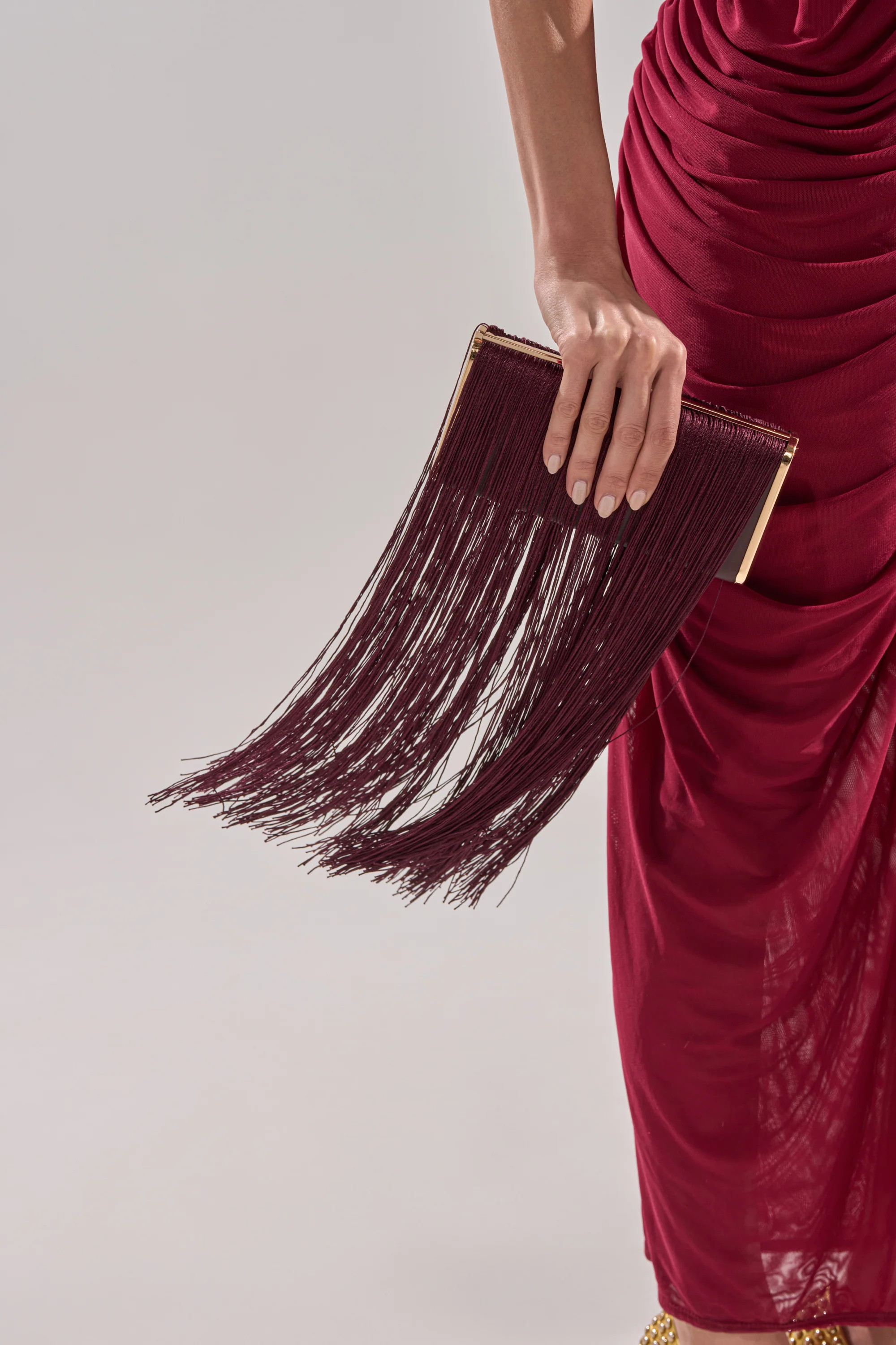 IN THE FRINGE CLUTCH | AKIRA