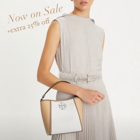 This neutral Tory Burch color block bucket bag is now on sale. Goes with everything and all summer outfits.

#LTKSeasonal #LTKSaleAlert #LTKItBag