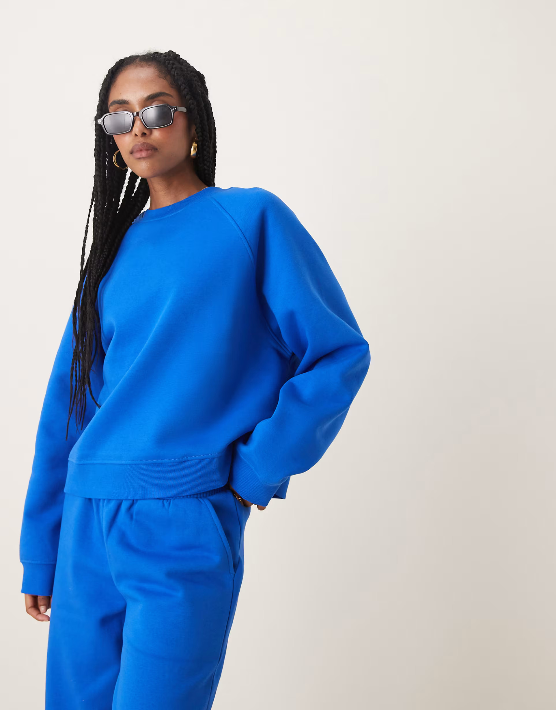 ASOS DESIGN oversized brushback sweatshirt with raglan detail in blue | ASOS | ASOS (Global)