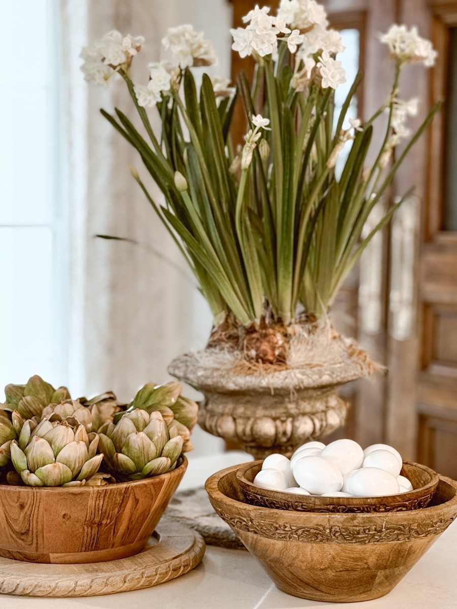 Here is a quick Spring centerpiece in our kitchen. The faux florals, artichokes, and eggs are a perfect addition to our Spring home decor. 

#LTKHome #LTKSeasonal