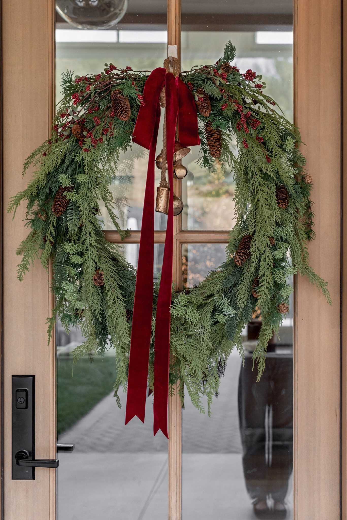 A little Christmas greenery + a velvet ribbon will always be my favorite combination. 🎄❤️

I love the natural, layered look of this Christmas wreath with its cascading greenery, pinecones, berries + vintage-inspired bells. Such a beautiful way to dress up a front door for the holidays!

Linked everything to recreate the look! 🤎

Christmas wreath, Christmas front door decor, holiday wreath, Christmas greenery, faux cedar wreath, realistic Christmas wreath, Christmas porch decor, Christmas bells, velvet ribbon, burgundy velvet ribbon, traditional Christmas decor, classic Christmas decorations, Christmas entryway, holiday home decor, Christmas decorating ideas, outdoor Christmas decorations