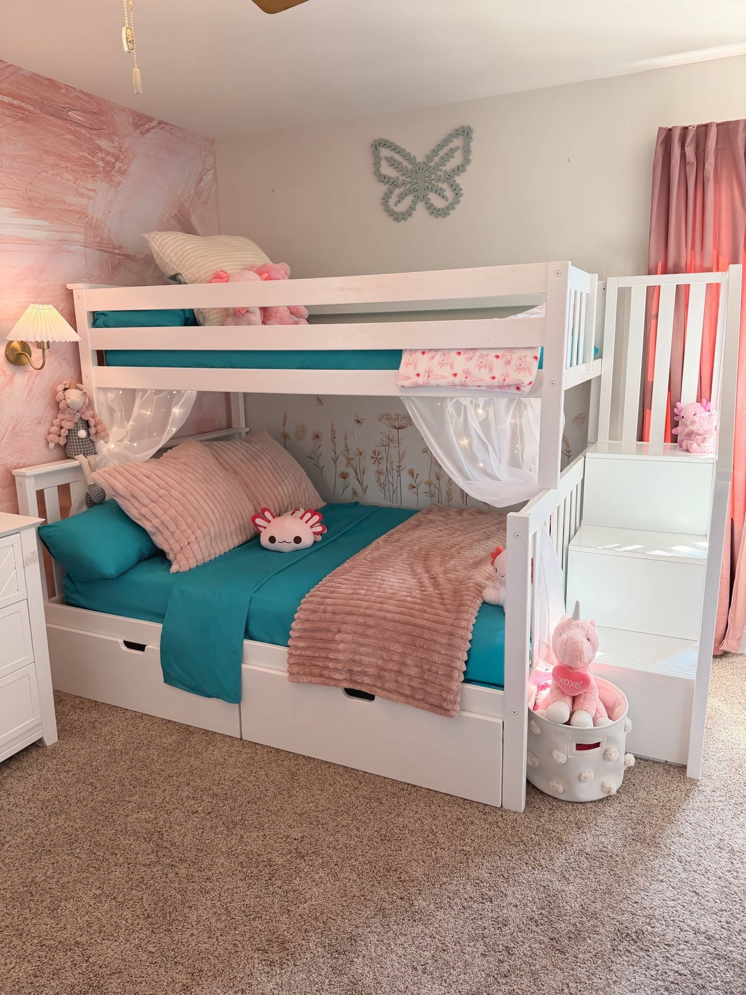 Girls bedroom makeover details are finally coming together 🩷✨ This bunk bed with storage has been one of the BEST space-saving upgrades for a shared kids room — plus all the cozy decor finds made it feel so much more functional and fun for her. From the blackout curtains to the stuffed animal storage and soft lighting, these are the little swaps that completely transformed her room without a full renovation.

Everything is linked in my LTK including the bunk bed, curtains, lighting, bedding, and organization finds 🤍 Save this for girls bedroom ideas, shared bedroom inspiration, and cozy kids room decor inspiration!

#girlsbedroom #kidsroomdecor #girlsroomideas #bunkbeds #sharedbedroom #kidsroominspo #cozyhome #homefinds #ltkit #amazonhomefinds