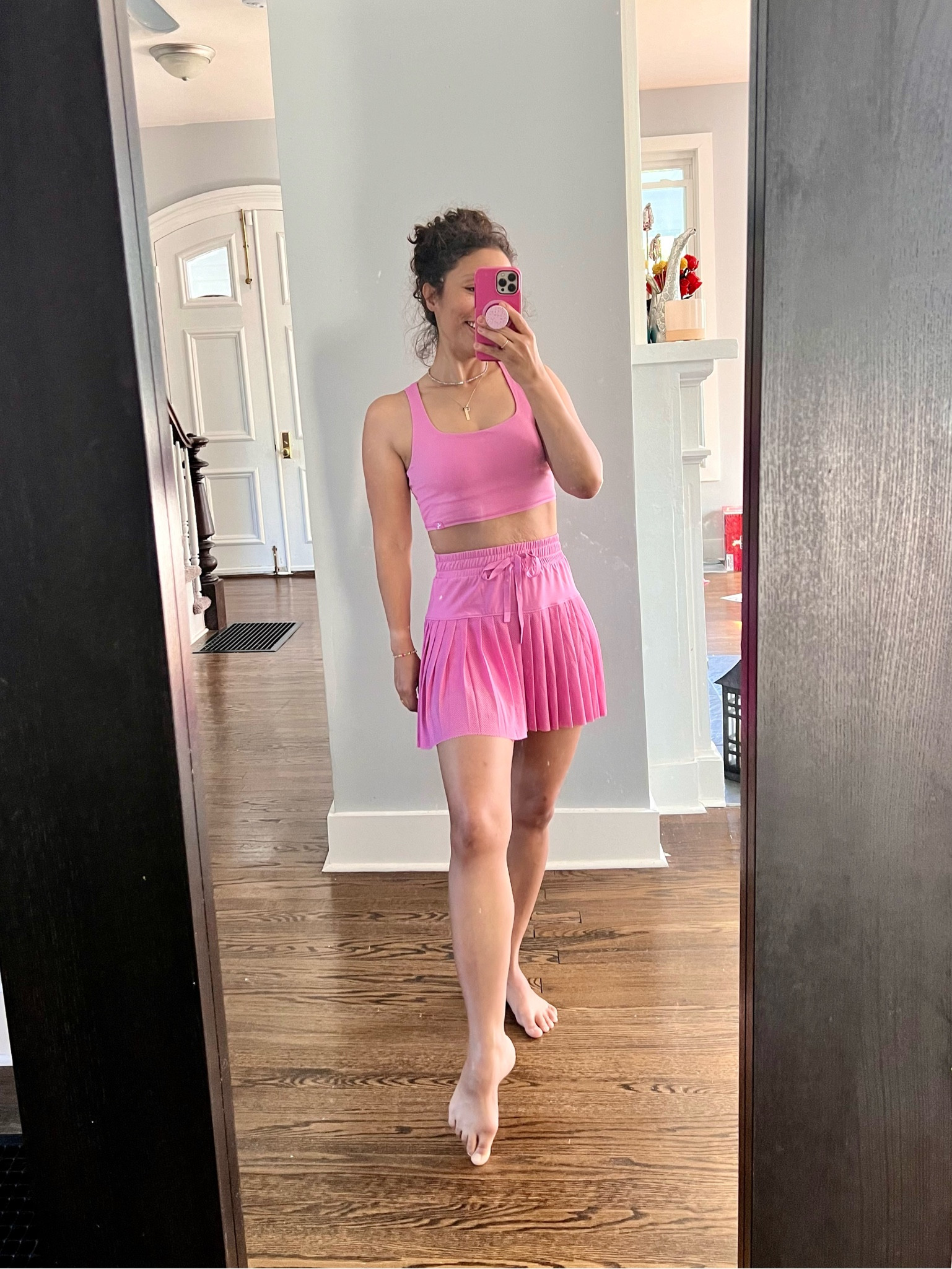 Calling it now… this will be THEEE set of Summer ‘24 💗 

The details on this set are insane. A basketball short sorta material for the over skirt. Built in shorts, with pockets. Adjustable waist. And the top has scoop neck, a built in bra with full mesh back. 

I’m wearing an XS top and S bottom.

Sizing recommendations: 
⬇️ size down in the top if between sizes 
⬆️ size up in the skirt if you carry weight in booty/thighs, for the best fit in the shorts. 

The waist is lose on my, but with the adjustable drawstring it stays up well and is super comfortable. 



#LTKSaleAlert #LTKActive #LTKFindsUnder50