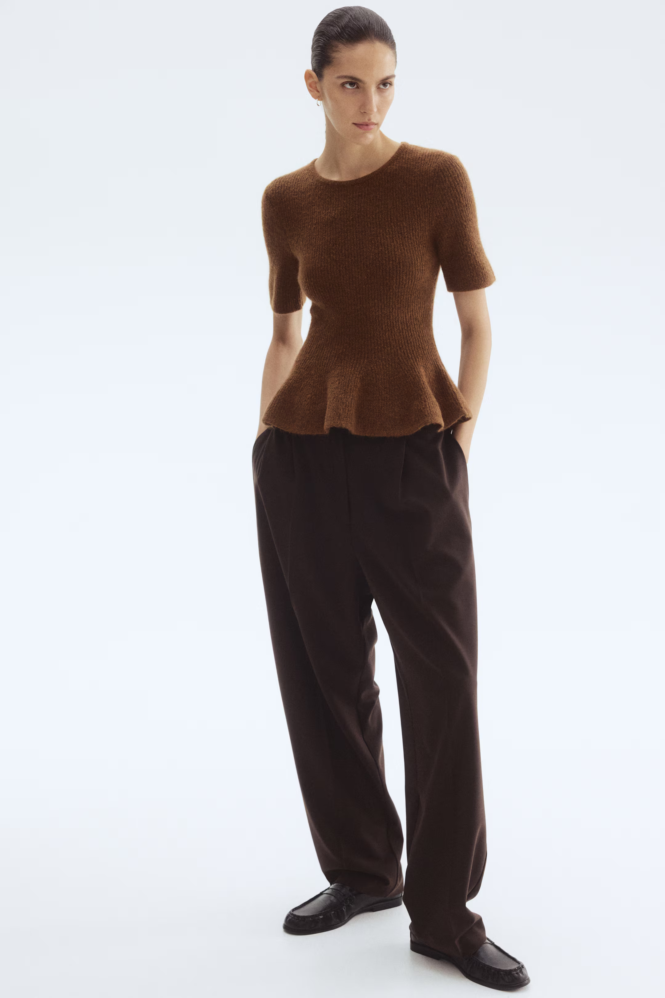 Ribgebreide peplumtop | H&M (DE, AT, CH, NL, FI)