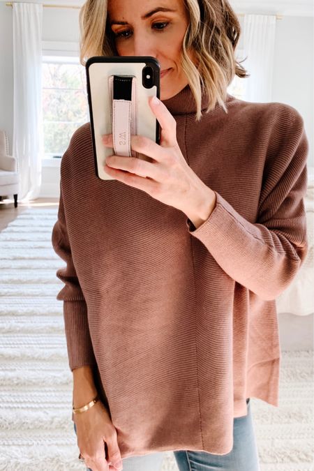 Obsessed with this Amazon sweater!!  It covers the booty, it stretchy and soft. You’ll want it in every color. I’m wearing small in Nutmeg.

#LTKunder100 #LTKstyletip #LTKSeasonal