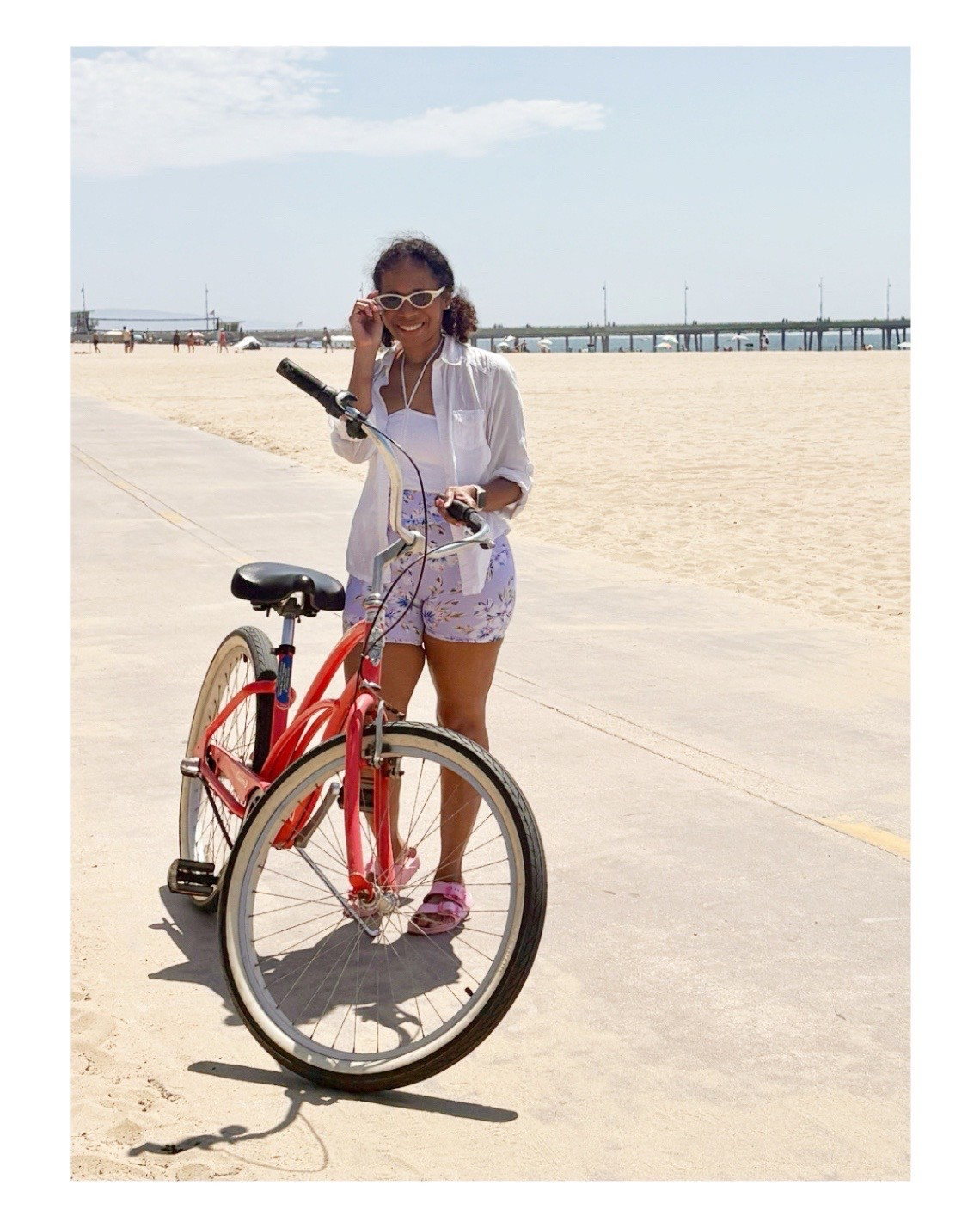 Coastal Cruising in Style 🚲🌊
☀️ Amanda Uprichard floral swim shorts – light, breezy, and perfect for biking the coast
👙 JMP the Label cropped swim top – styled upside down for secured coverage and a halter-tie twist
🤍 White burnout cotton button-up – easy, lightweight layering
💗 Arizona Big Buckle Birkenstocks – comfy with a pop of pink
😎 Aire ivory Cat Eye sunglasses – chic + retro

🌊 Love this look? Grab the essentials linked here!

#ModestSummerStyle #ModestSummerFashion 
#ootd #BeachOOTD #ResortStyle #SummerStyle #EffortlessStyle 

#LTKTravel #LTKStyleTip #LTKSwim